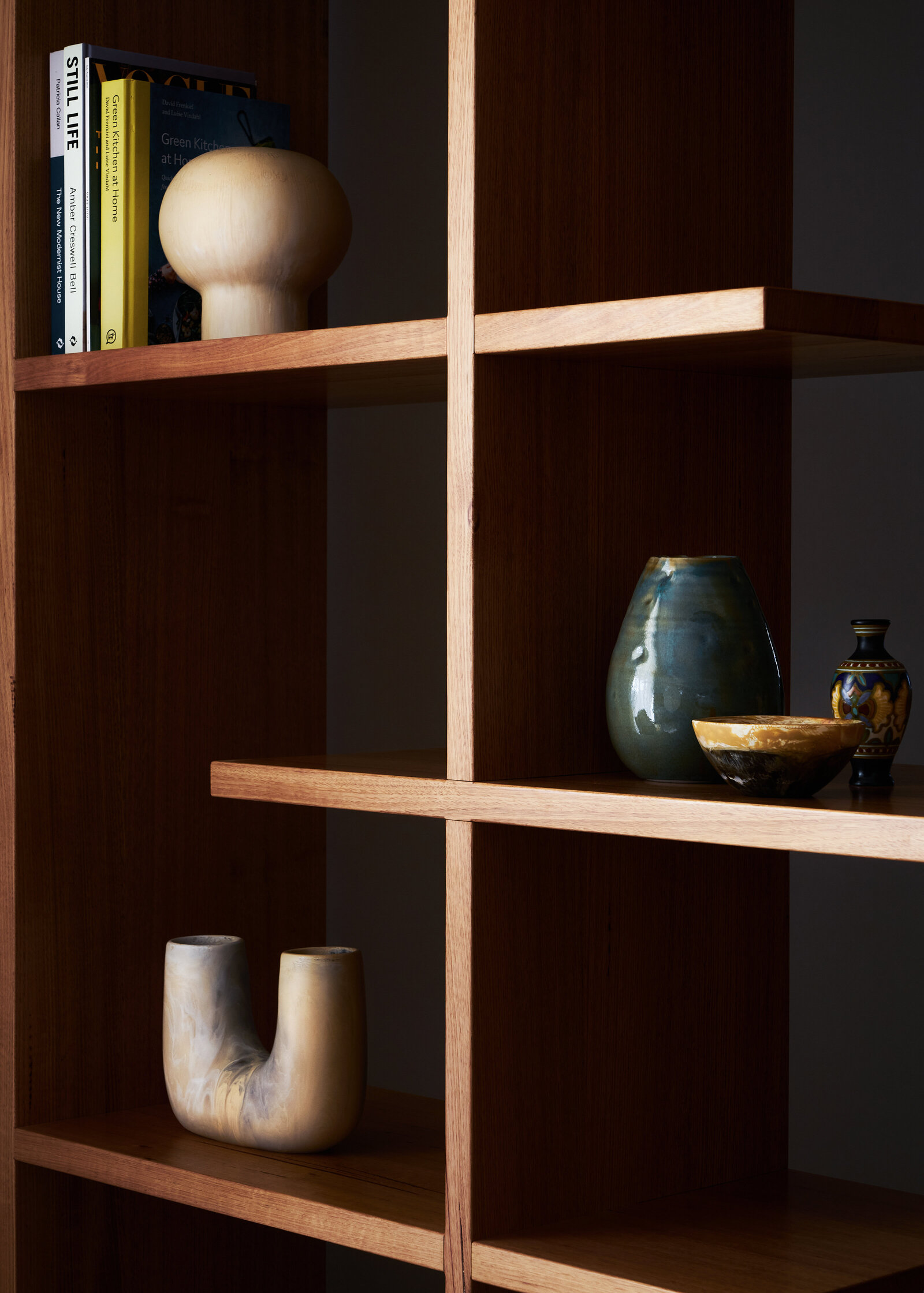 timber bookshelf with styling items