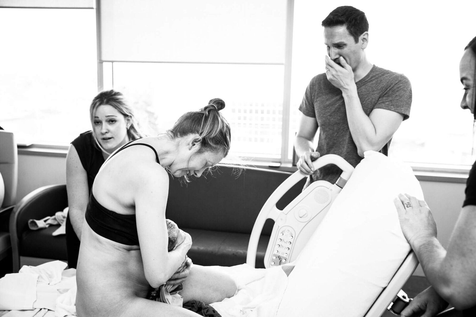 victoria-hospital-london-ontario-birth-photography-birth-moment-reaction