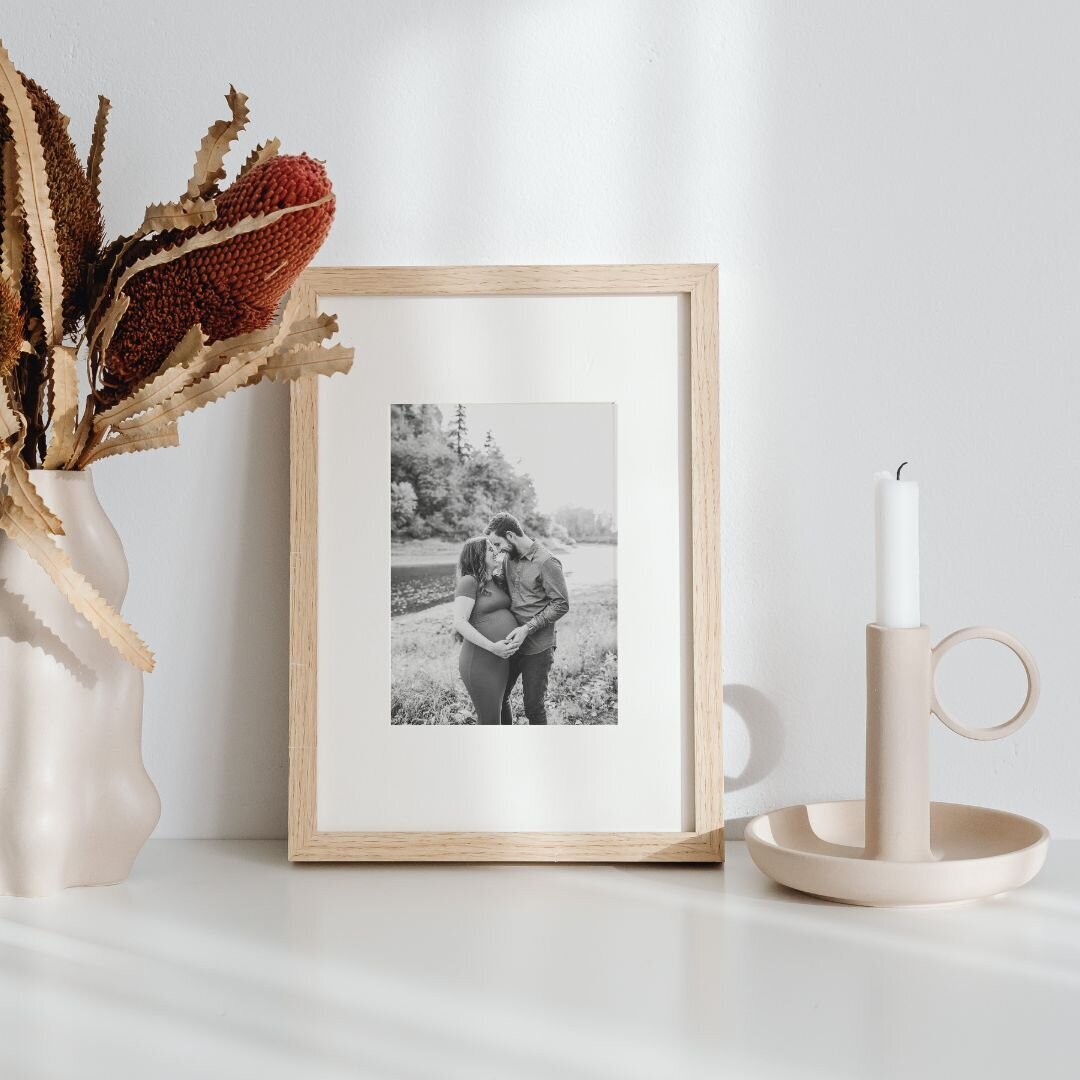 Photographer in Portland, Oregon shares framed art work of pregnant couple.