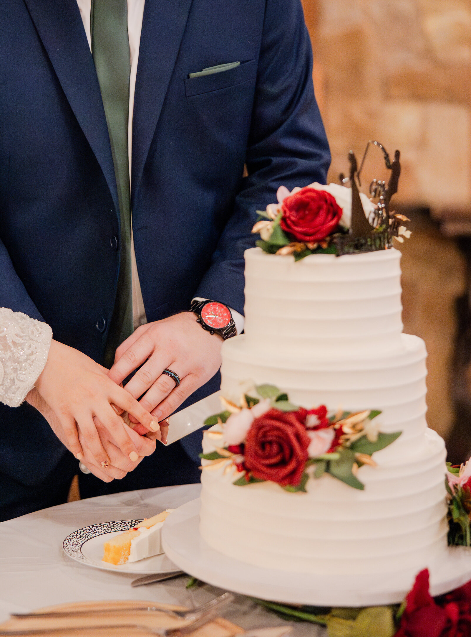 Detail close up shot of the cake cutting ceremony