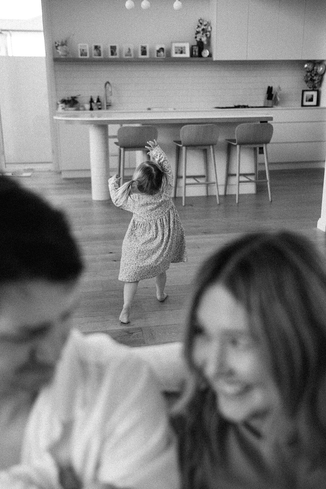 candid in home newborn photographer