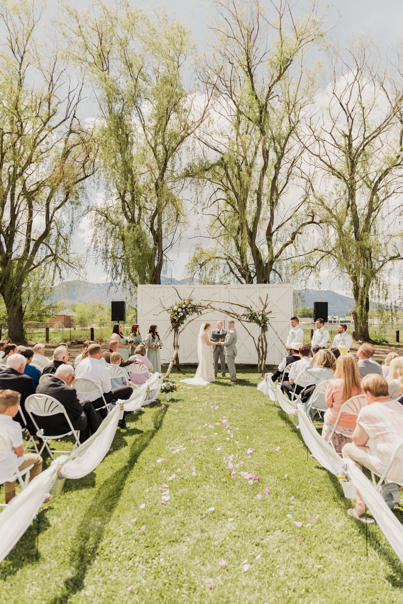 Wedding ceremony of bride and groom in Hyrum Utah taken by Robin Kunzler Photo