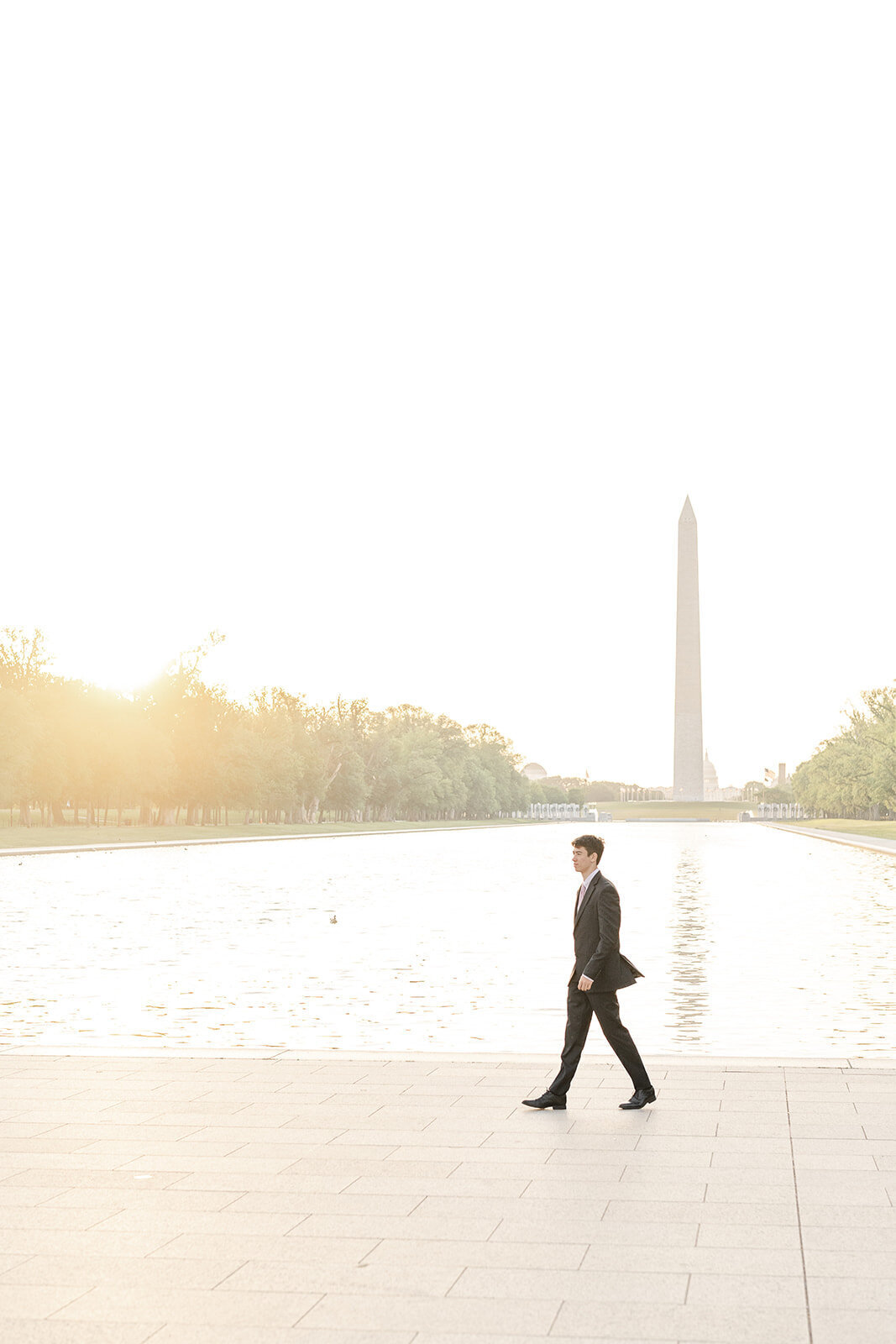 boy walking during Reflecting Pool senior picture