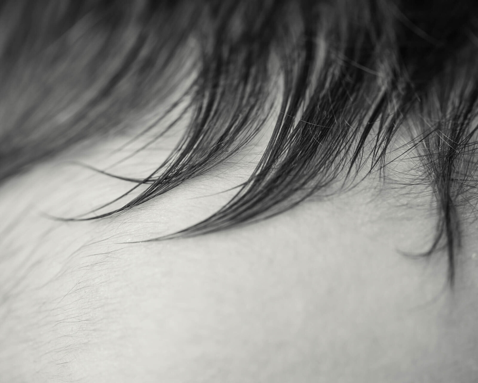 picture of baby hair whisp in black and white
