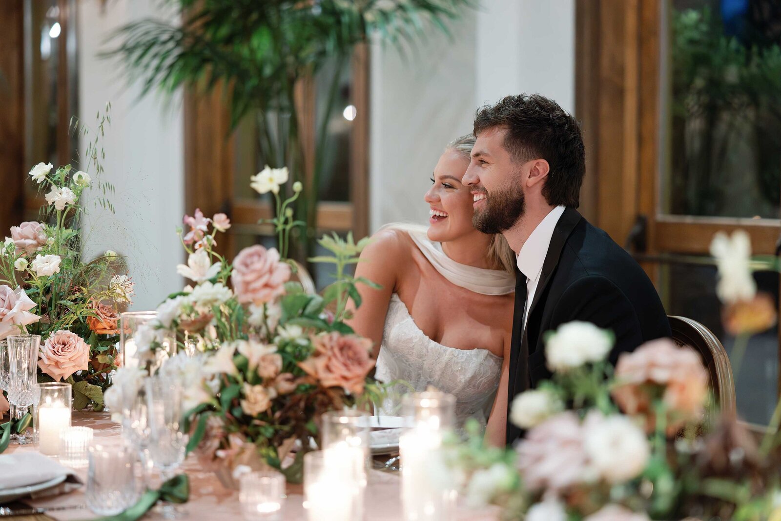 Bride and Groom walk down the aisle together, hand in hand, after sharing their first kiss. 