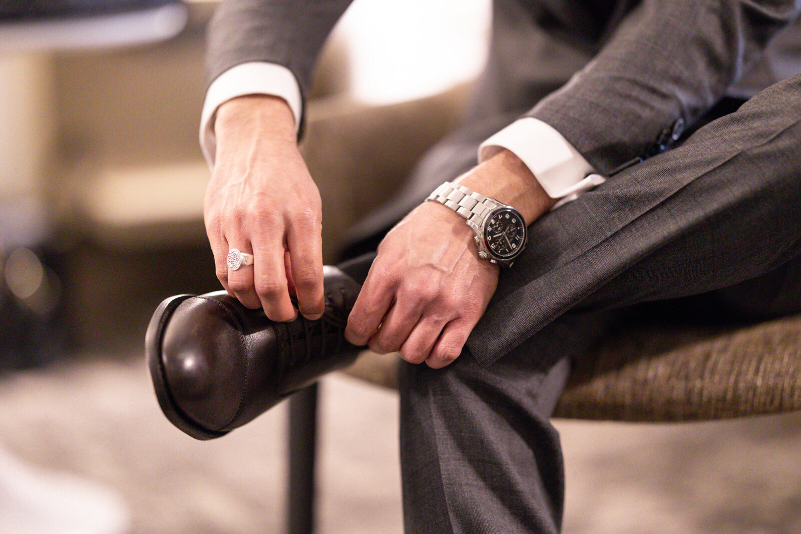 Groom-tying-his-shoes
