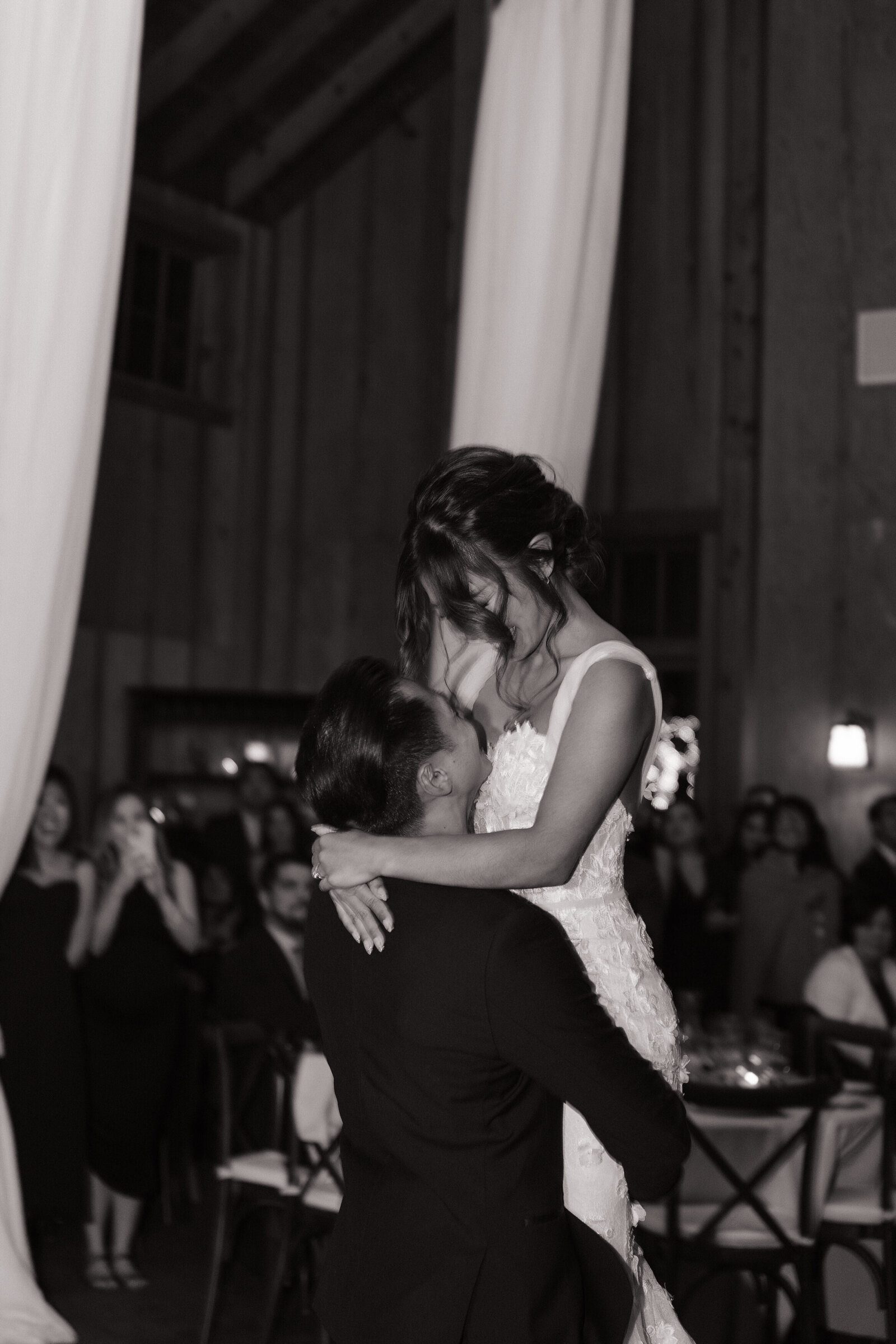 Bride and groom first dance on rooftop in downtown Seattle elopement