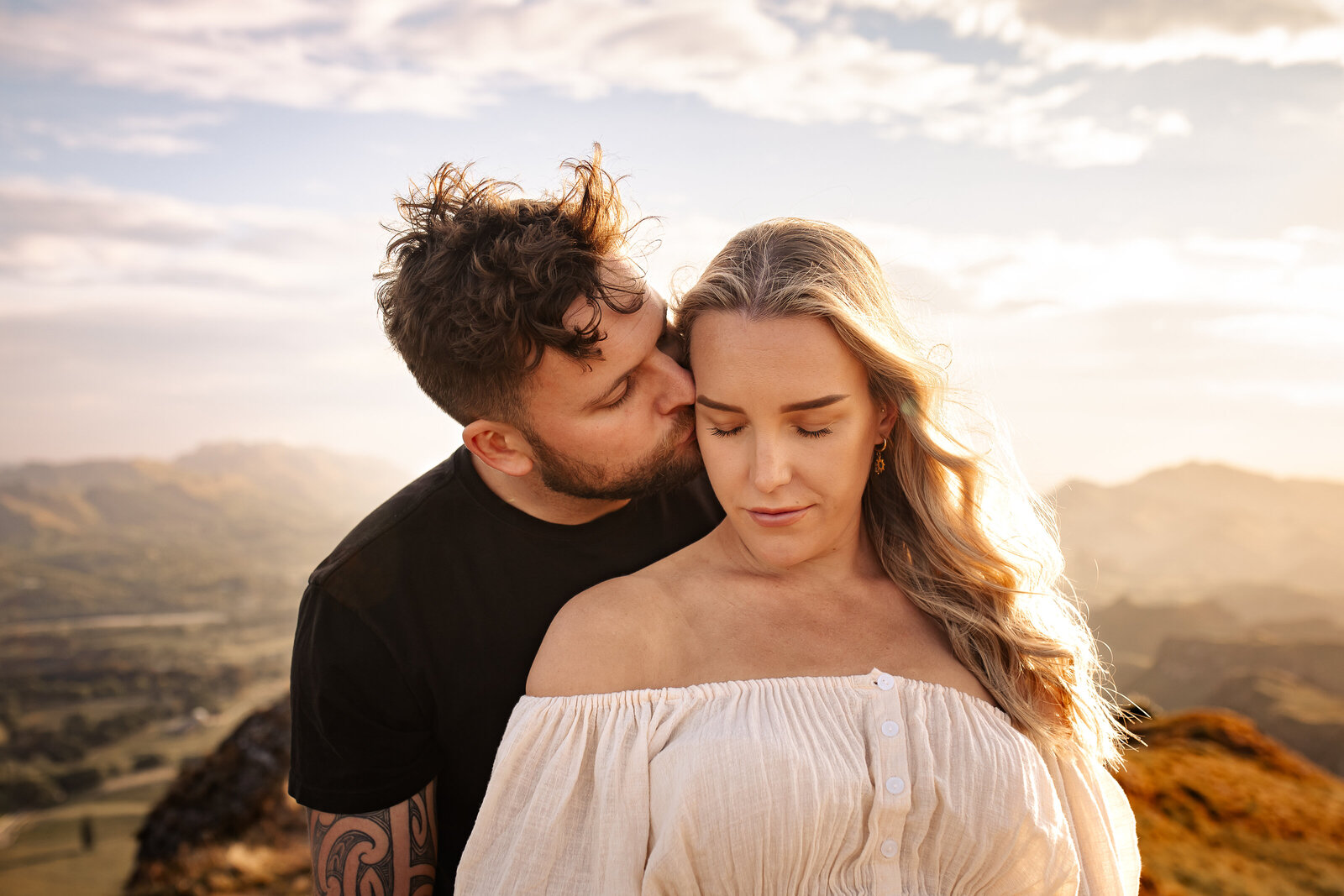 Te Mata Peak family session with parents in styled client clothing, photographed by a Hawke’s Bay maternity and family photographer