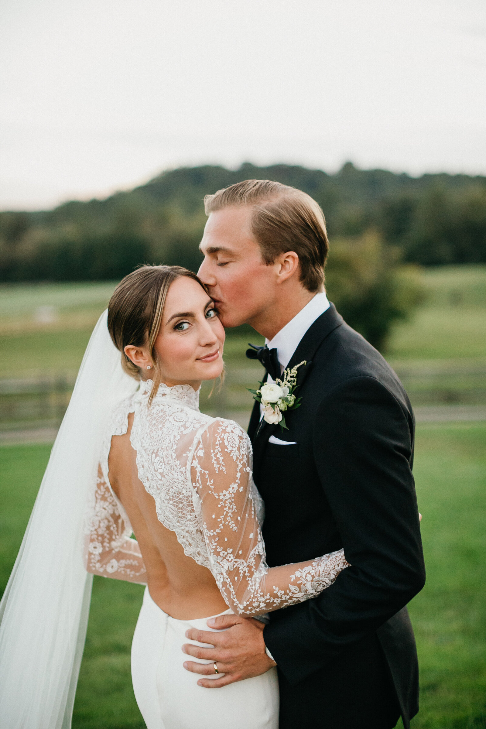 Bride and groom portraits at this  summer Radnor Hunt wedding.