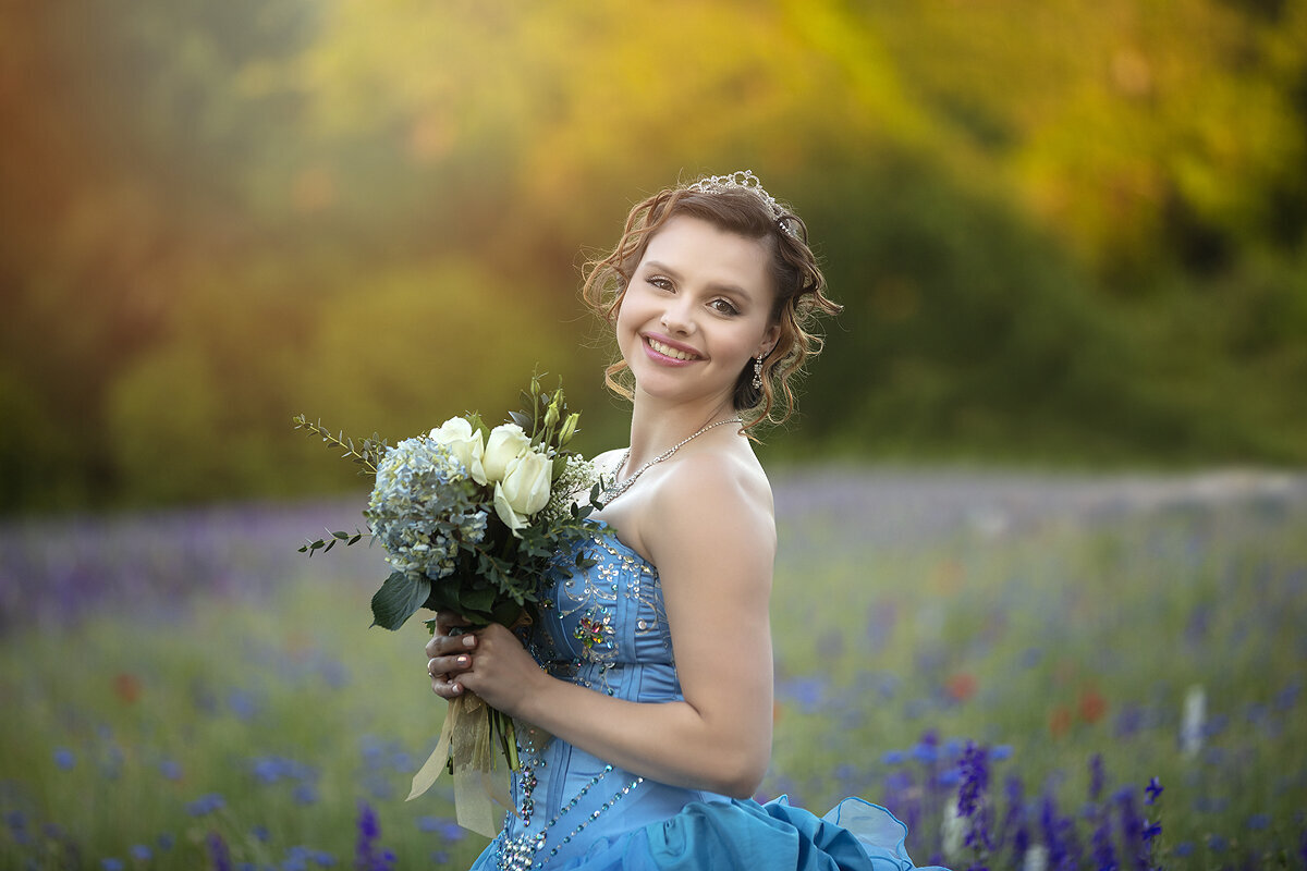 Pretty girl in prom dress in Richardson wildflowers