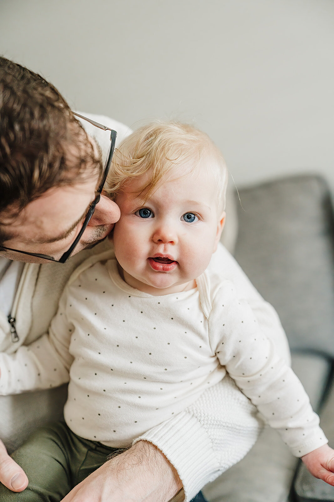 close up of baby with father in home