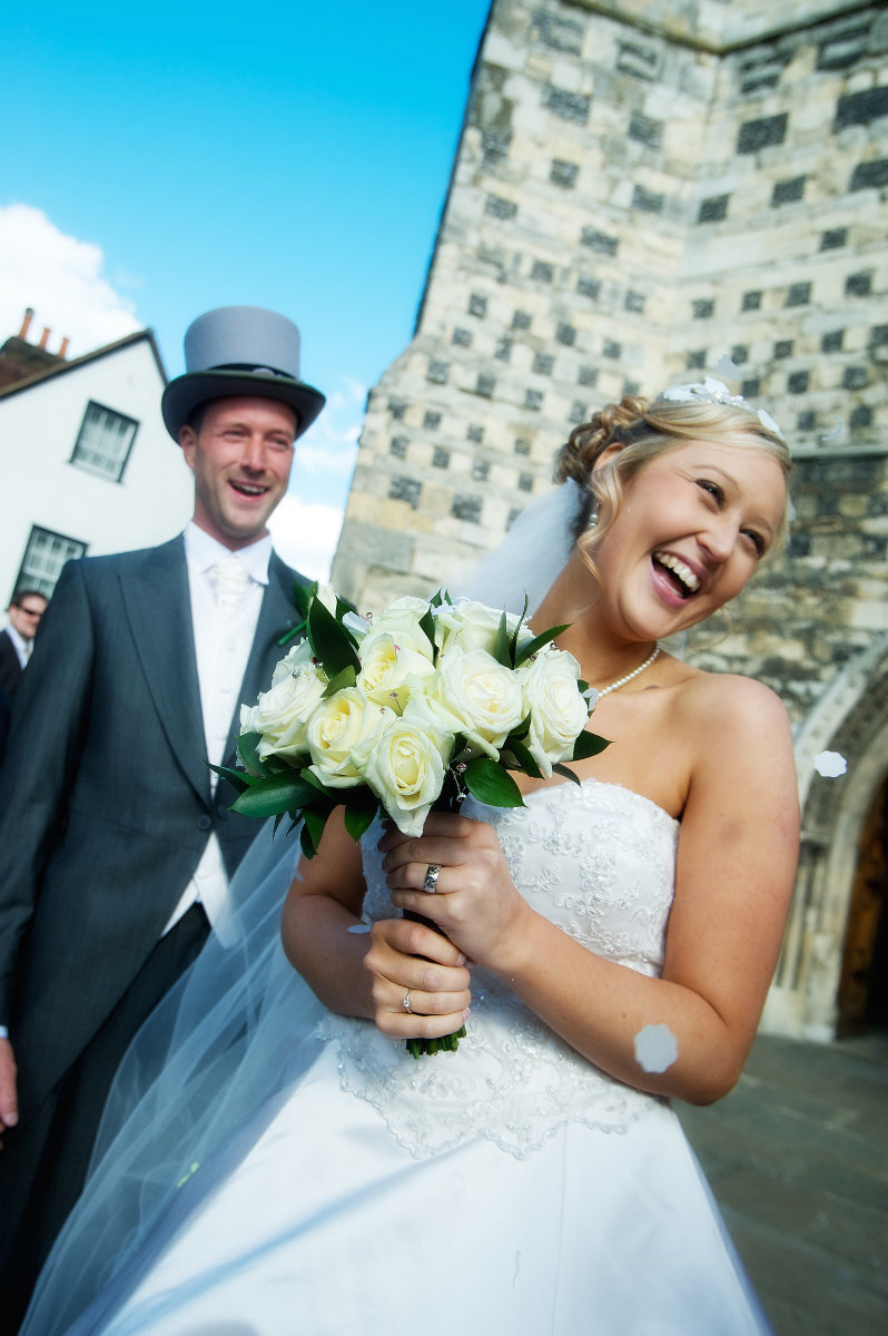 Bride and groom laughing