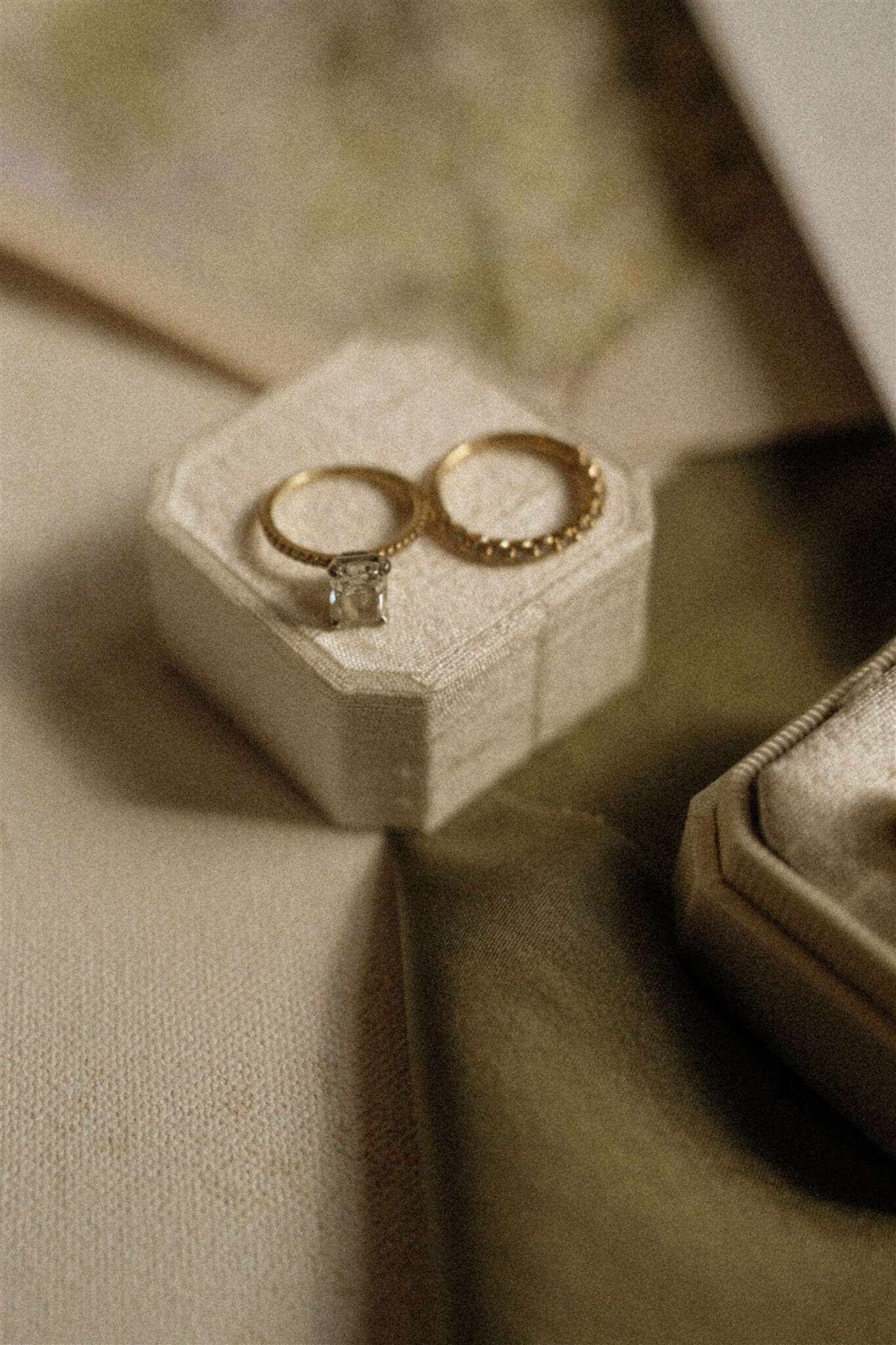 Vintage wedding details of rings on ring box