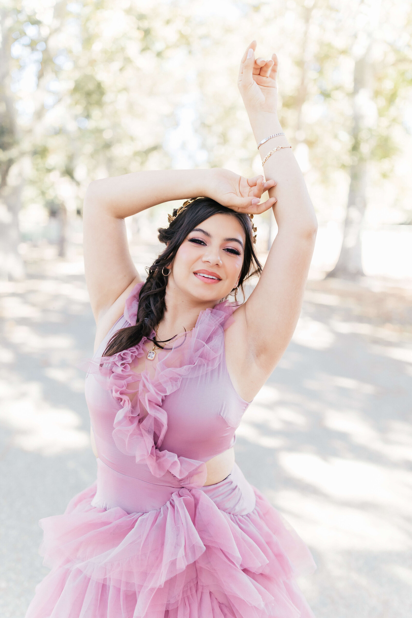 High school girl wearing whimsical flowy dress senior photo session