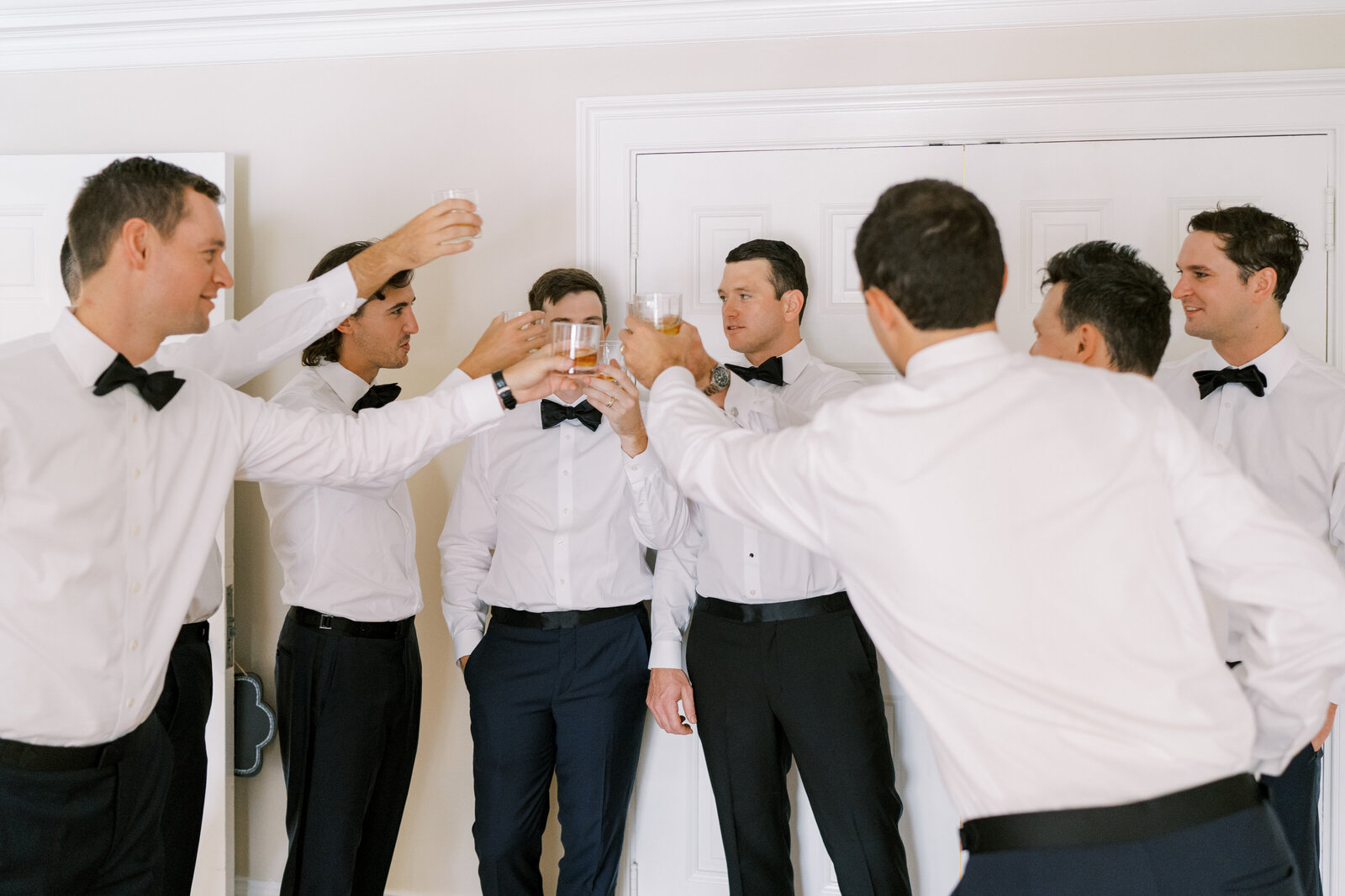 Groom and groomsmen cheers
