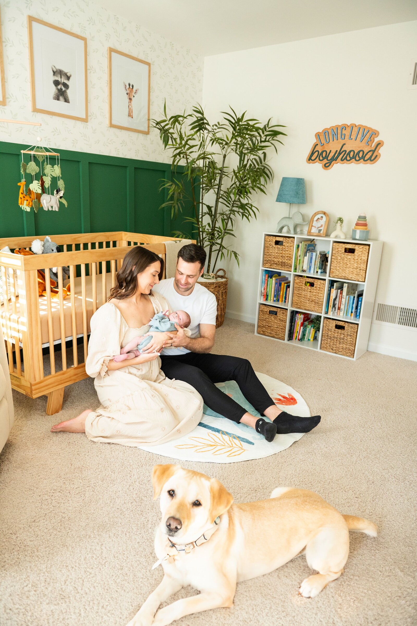 family in nursery with dog