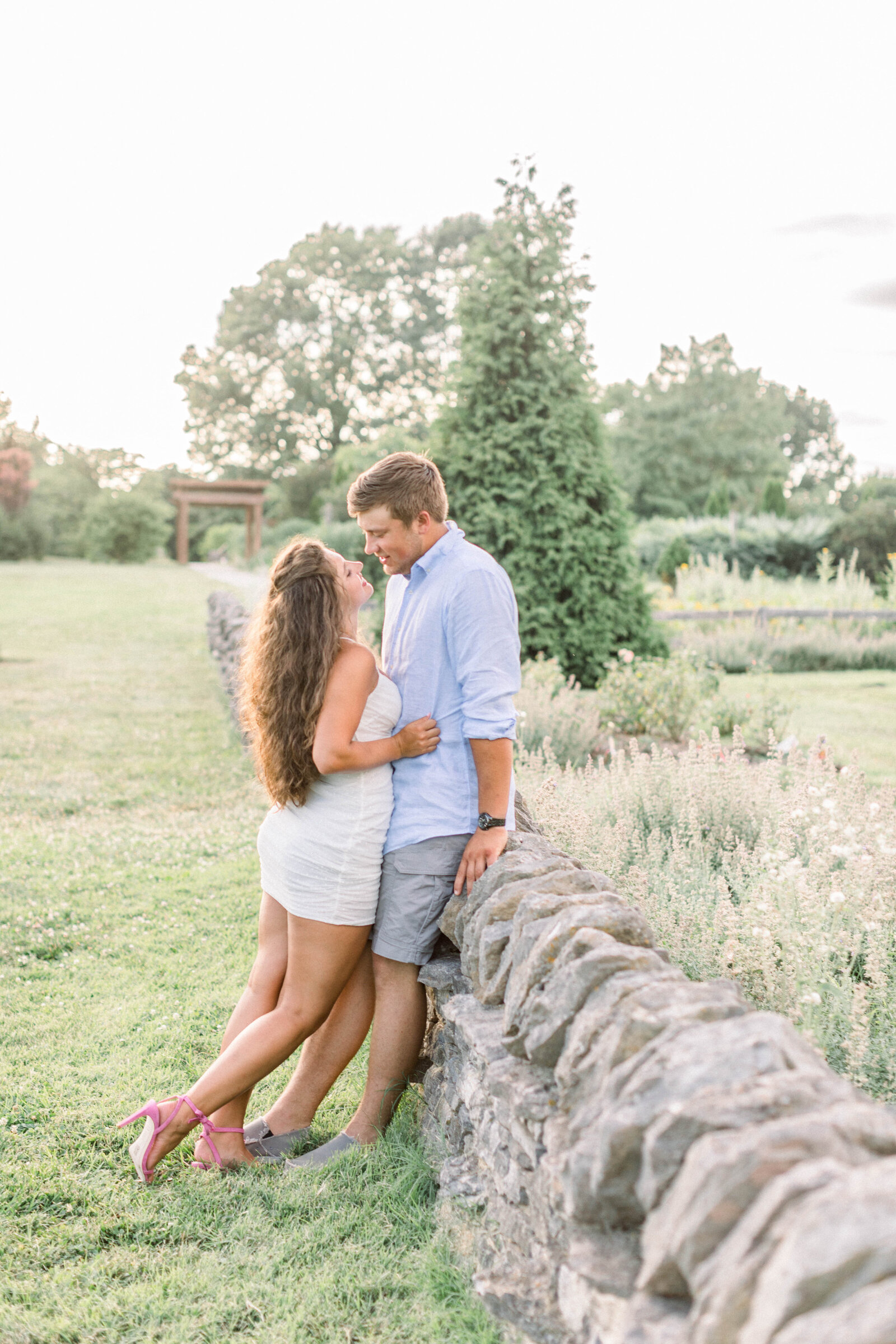 garden engagement session at sunset