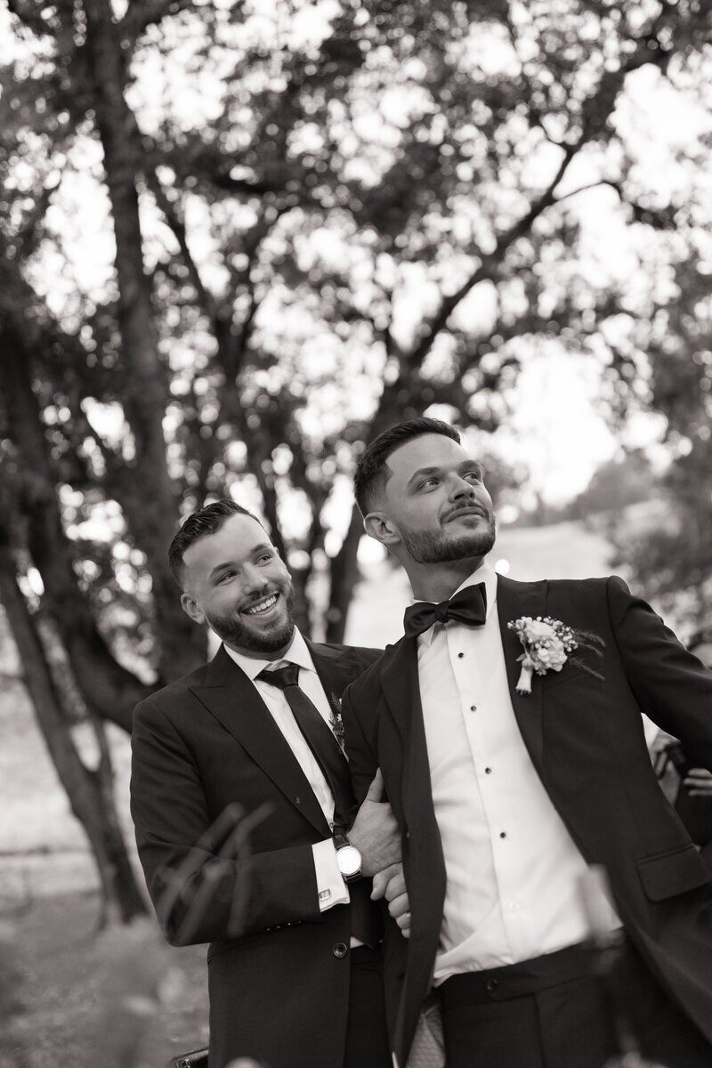 Grooms laughing and smiling by Erica Rochelle photography best northern california wedding photographers
