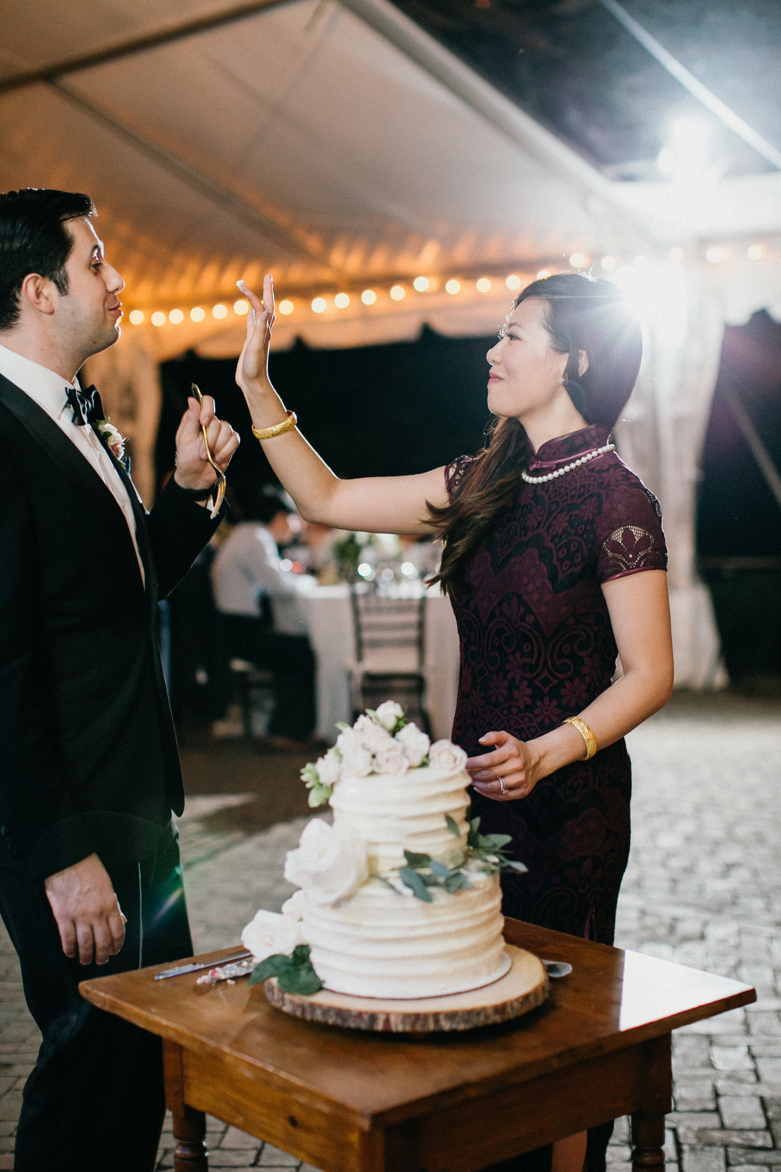 Quick outfit change for the bride, then it's time for cake.