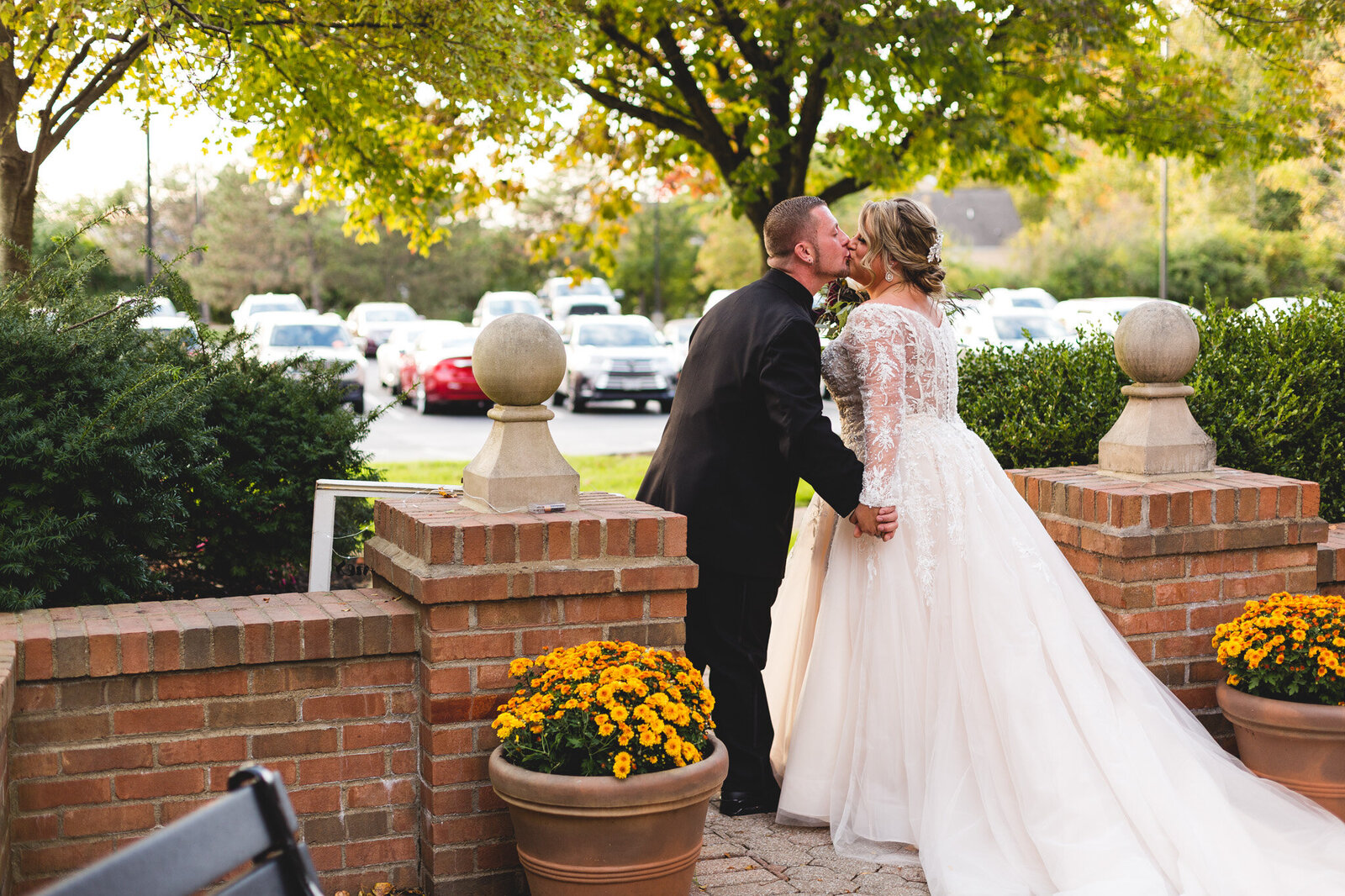 upper arlington wedding ceremony recessional bride and groom kissing ohio wedding photographer