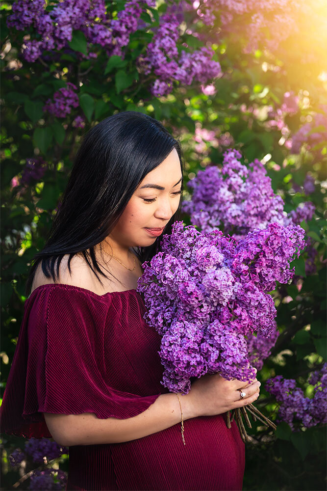 beautiful-asian-korean-woman-smelling-lilac-flowers-pregnant-maternity-red-dress