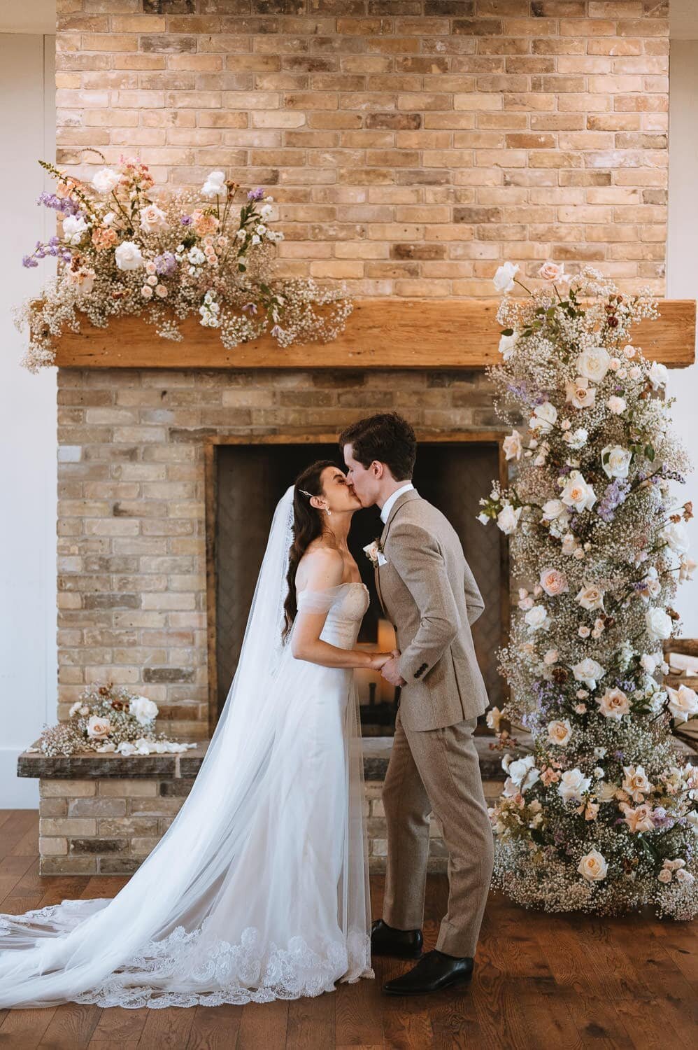 elora-mill-foundry-chapel-wedding-ceremony-first-kiss