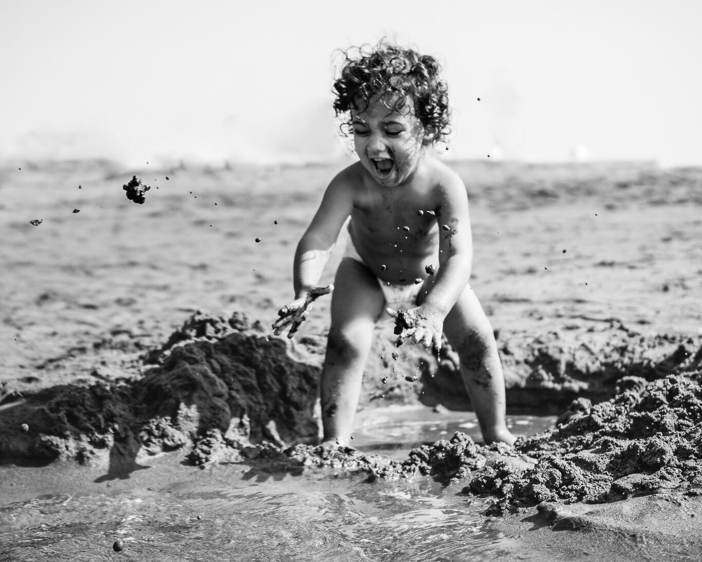 family-photographer-child-portrait-playing-in-mud-pure-joy-4