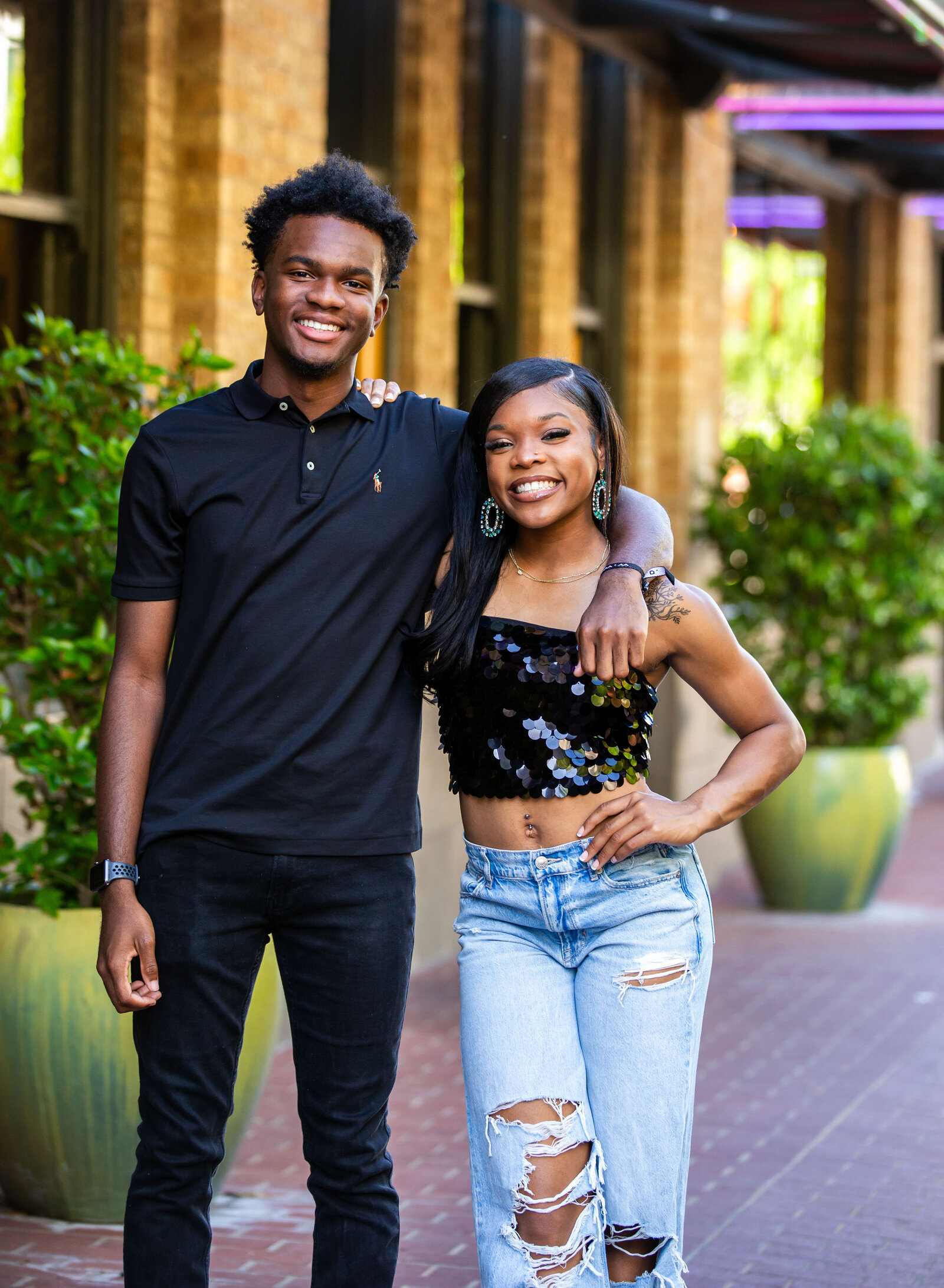 casual senior boy and girl downtown