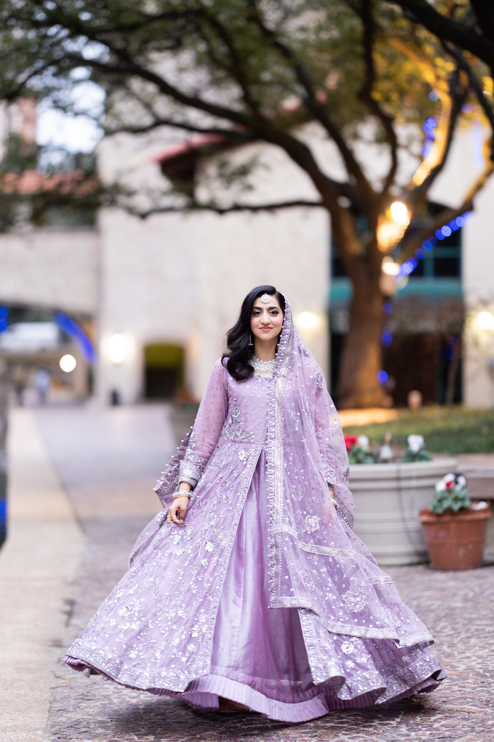 Desi-dallas-bride-in-wedding-dress-twirl-pose