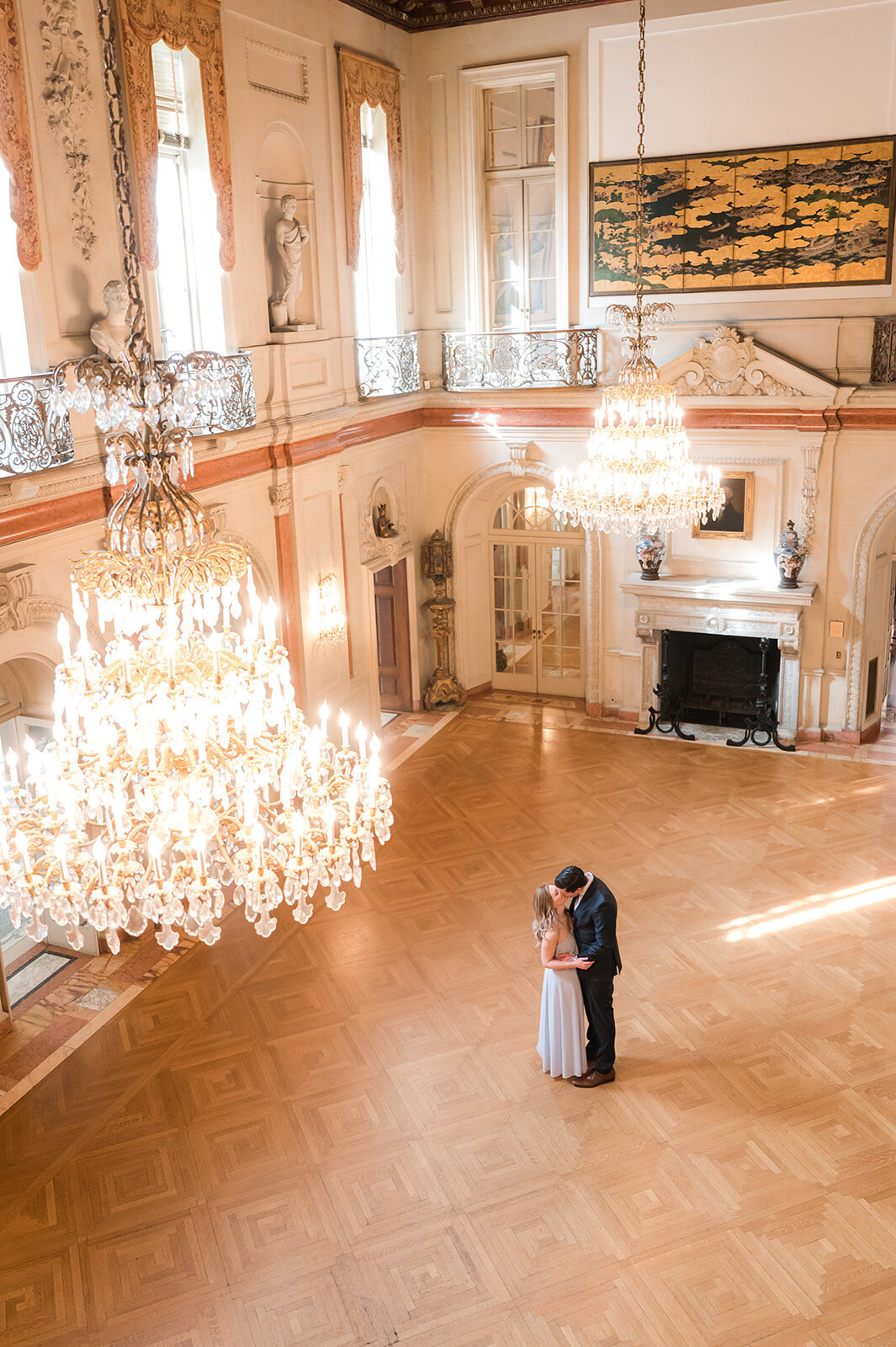 Engaged couple dancing in the grand ballroom of Larz Anderson House during elegant Washington DC engagement session.3