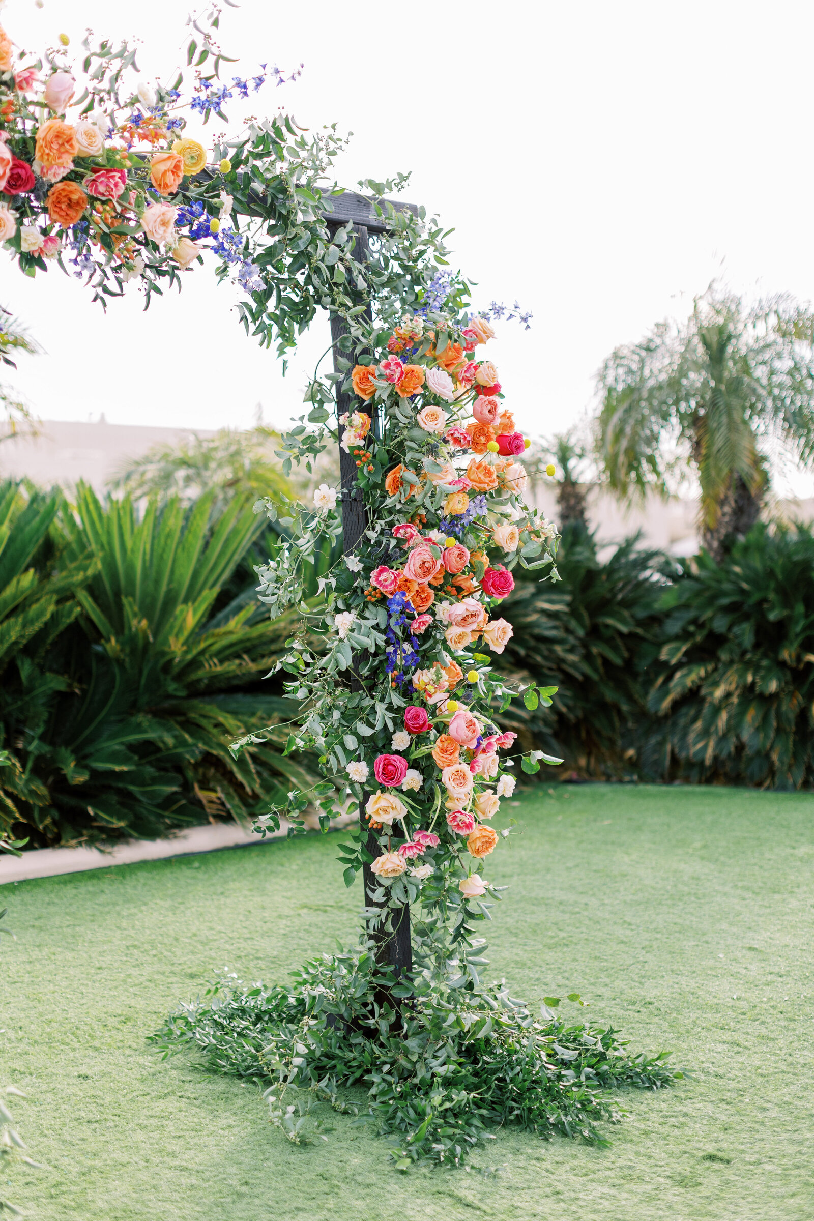 scottsdale-florists-greenery-floral-arch-installation-pink-peach-yellow