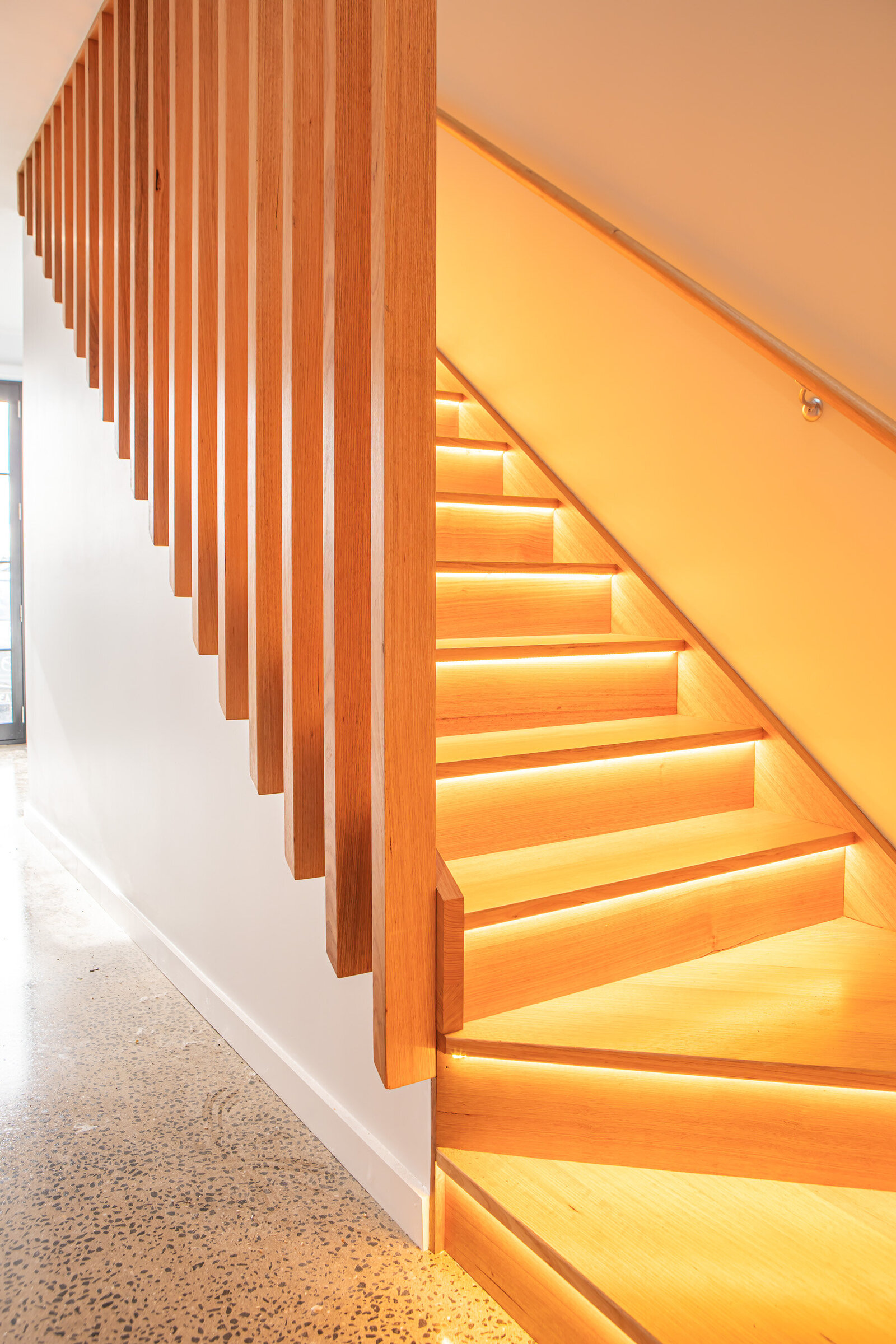 Timber staircase with lighting strip feature on every step for custom build