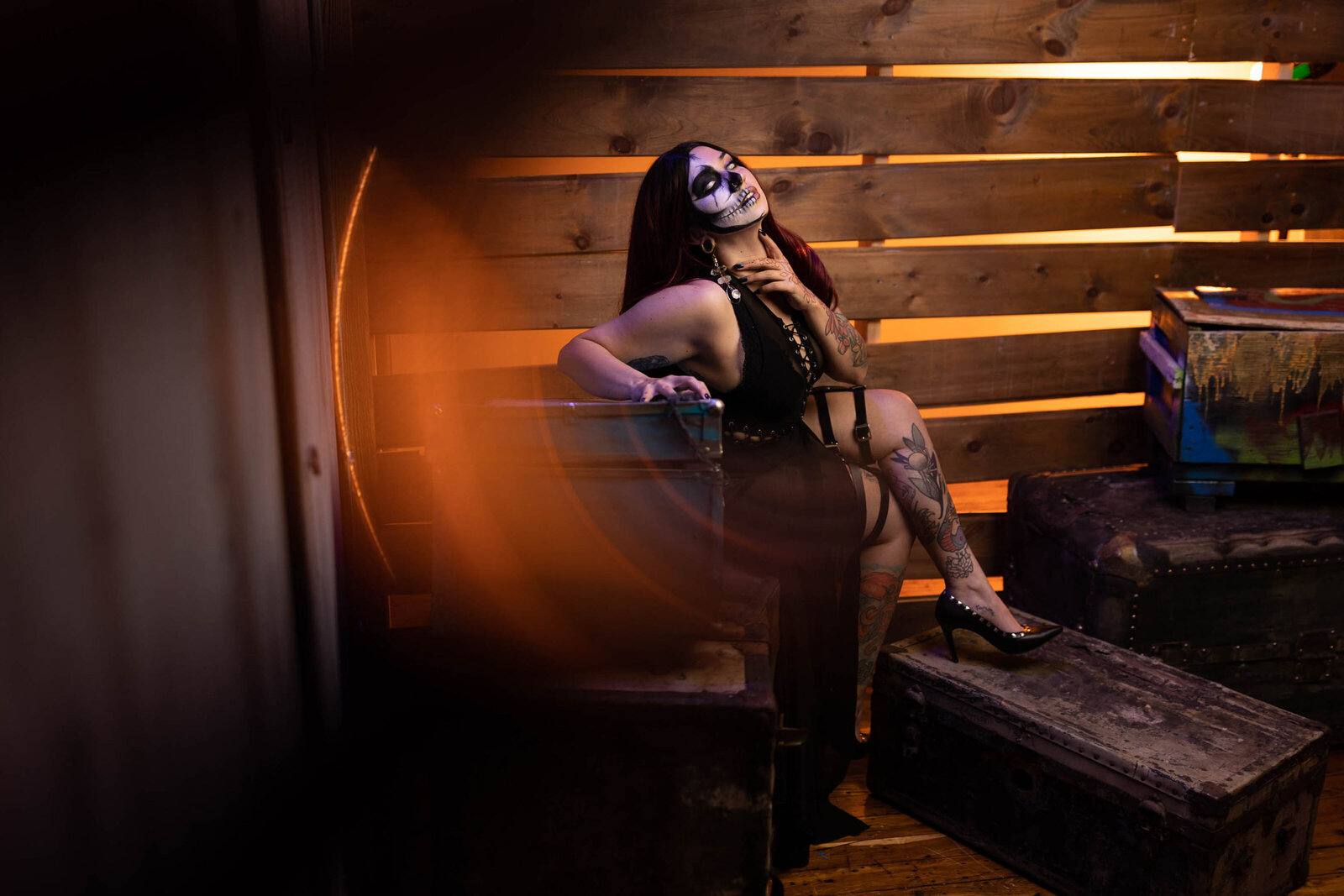 scary looking woman in a black lingerie