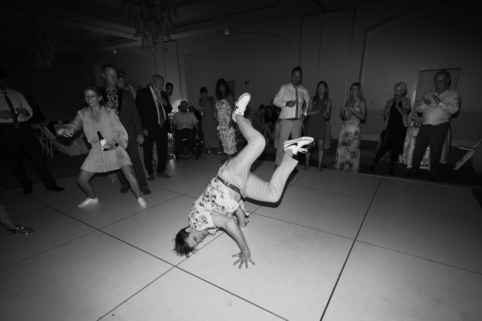 wedding guest dancing by fort myers florida wedding photographer
