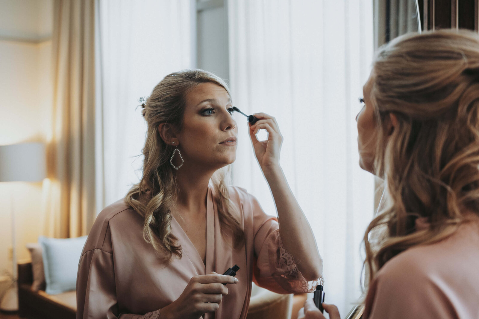 Bride gets ready at Central Station Hotel for her reception