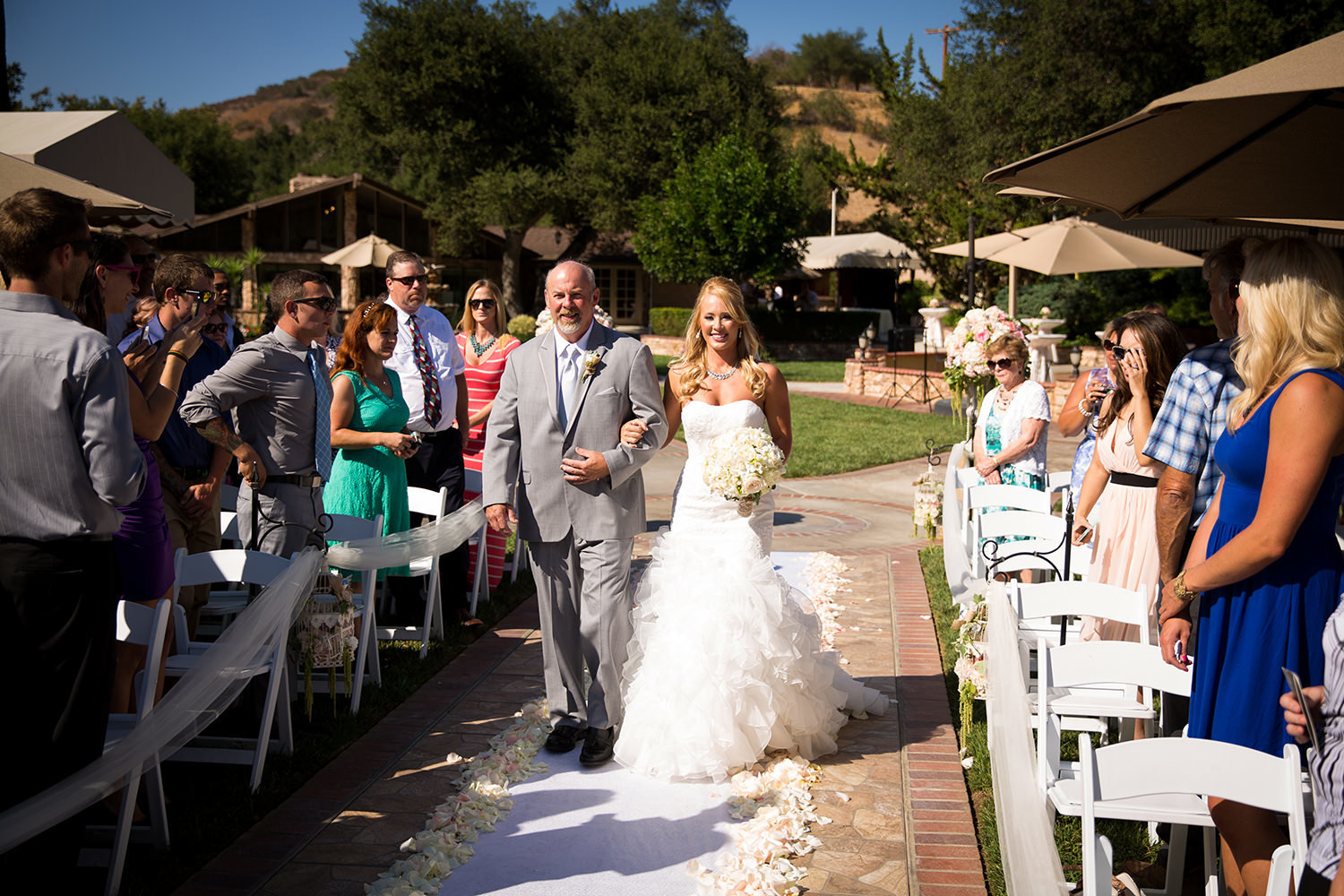 father walking daughter down the aisle