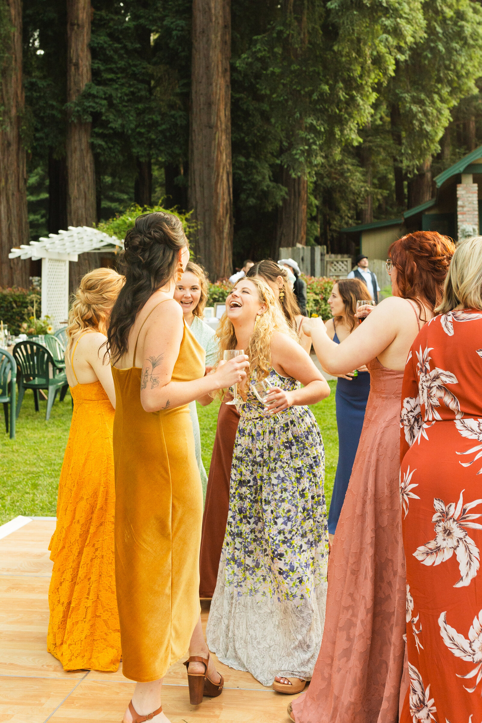 Colorful wedding reception in Santa Cruz, California in the redwood trees.