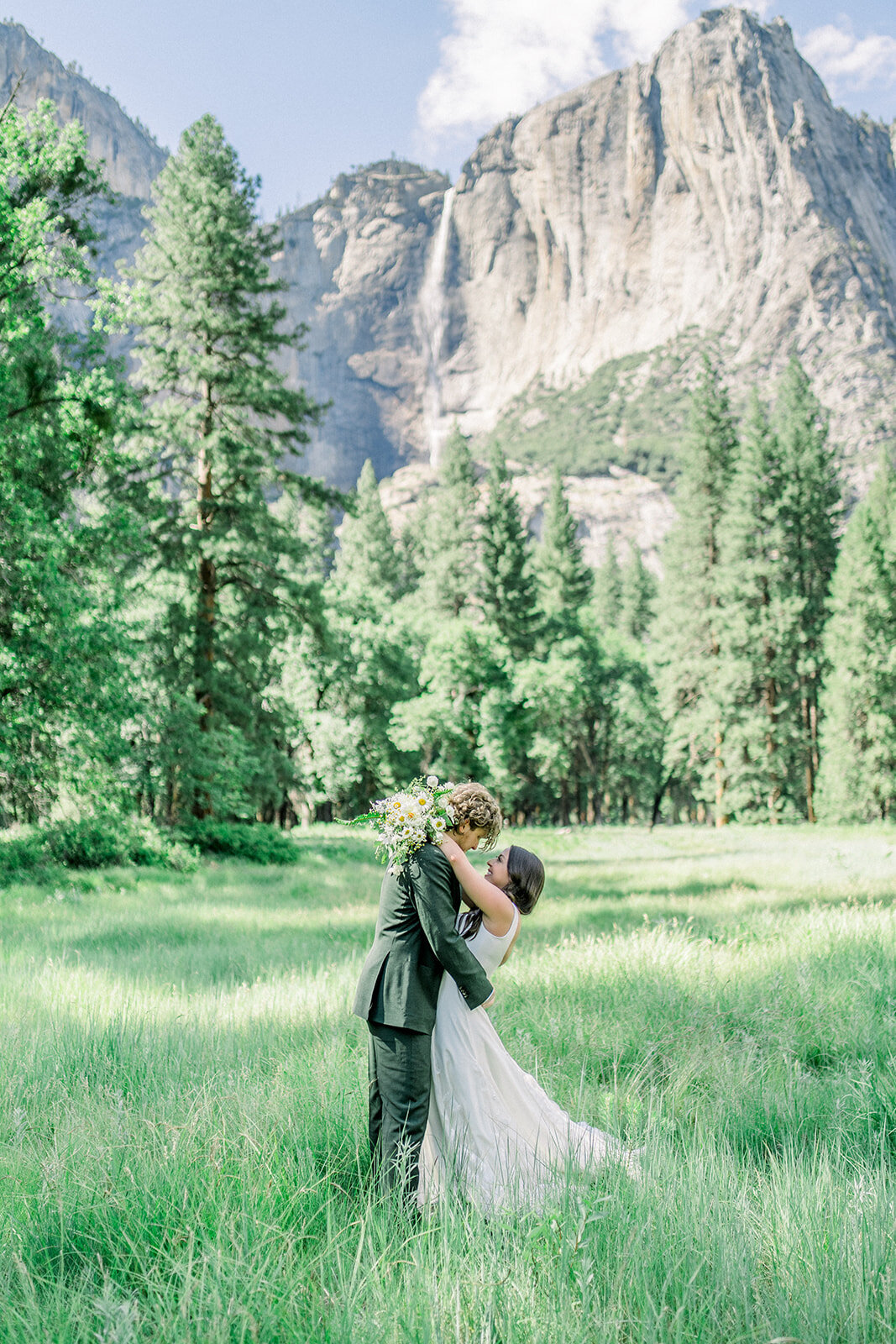 Bride and groom in from of El Capitan at their Yosemite National Park wedding