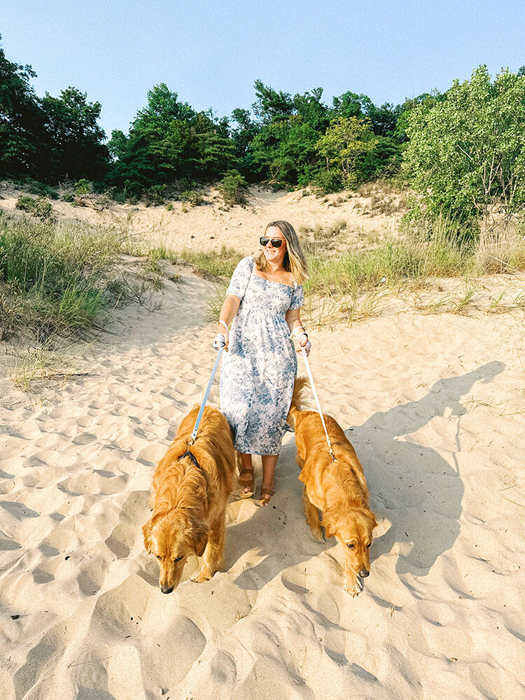 girl with golden retrievers