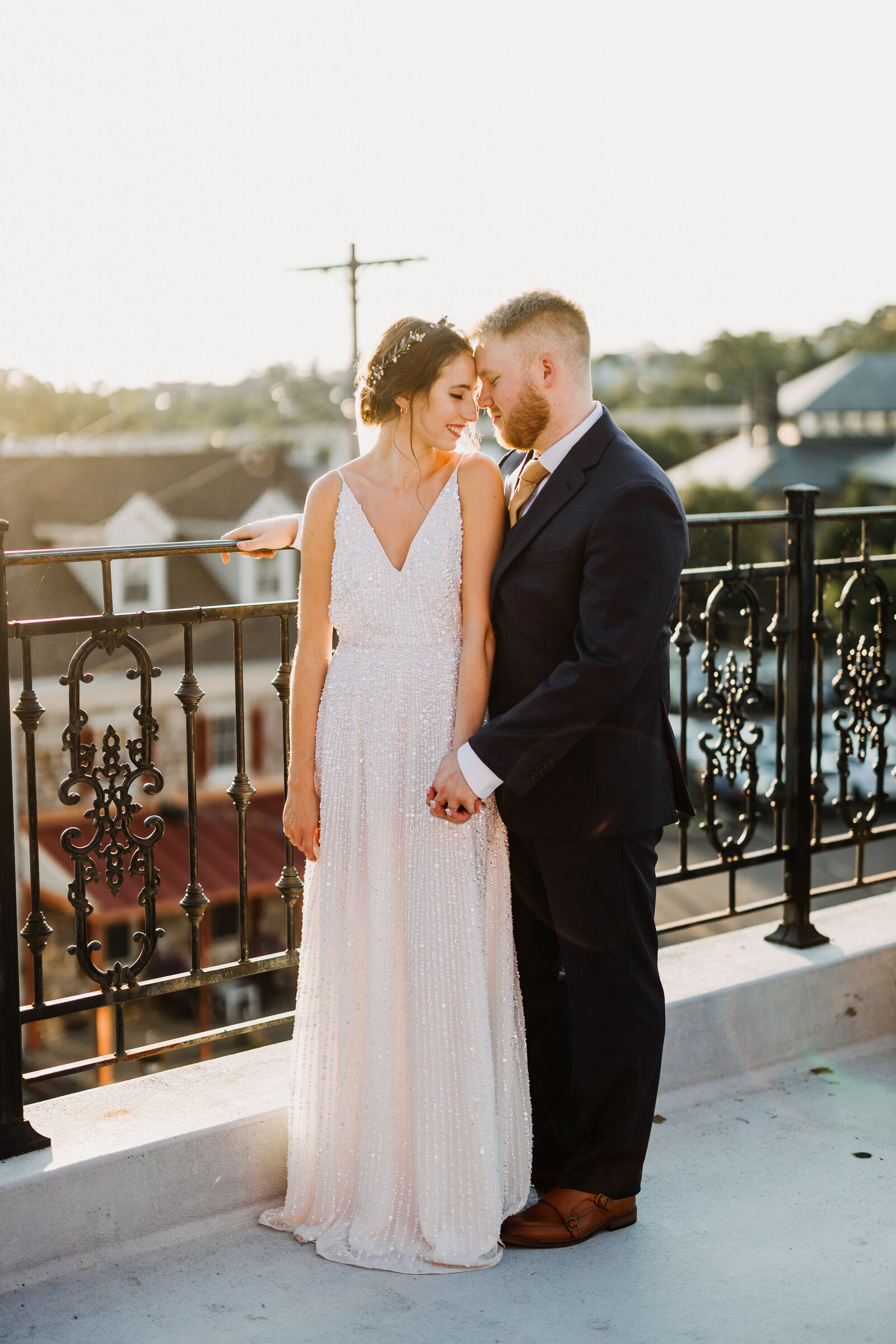 bride and groom rooftop sunset