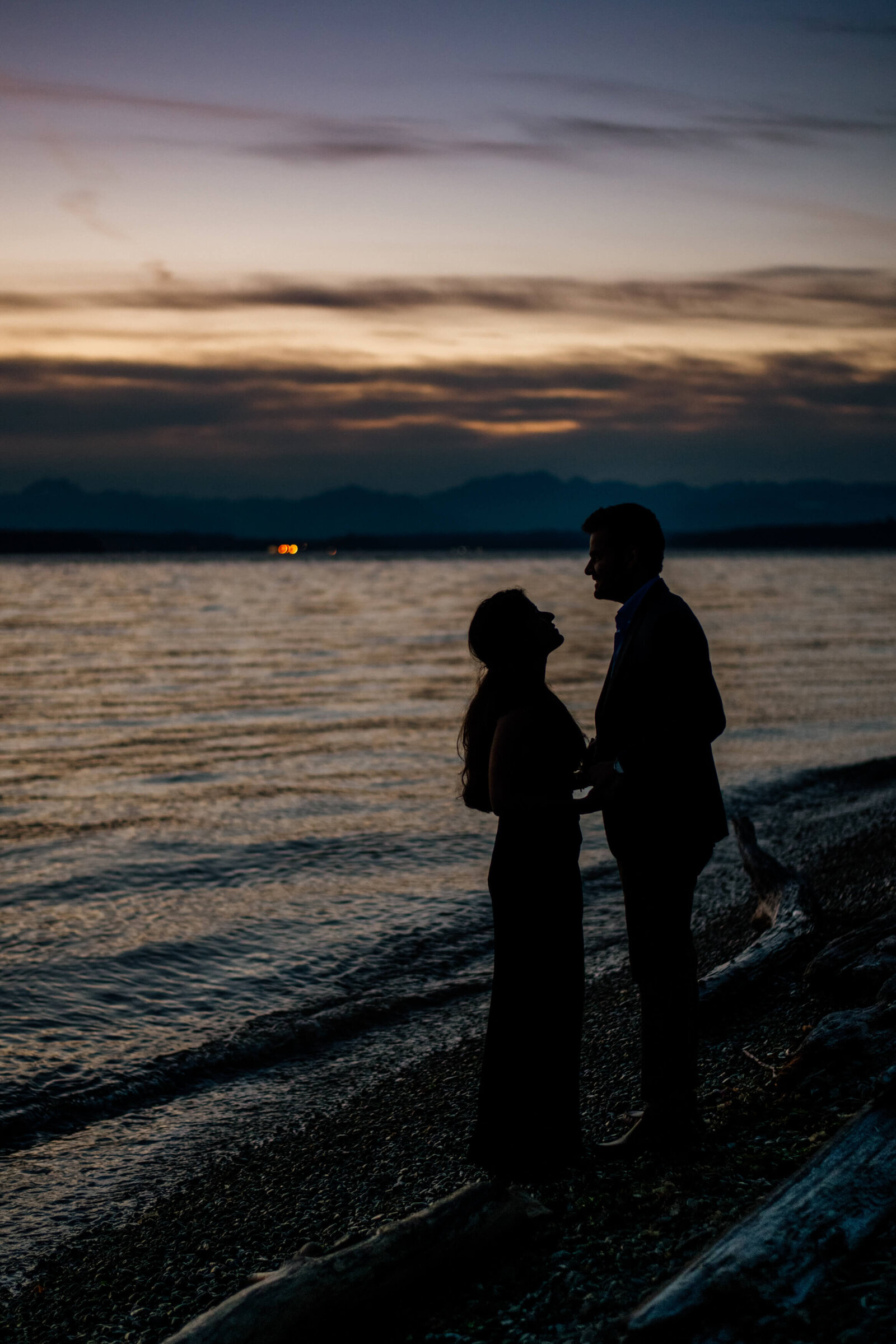 Couple's silhouettes at sunset.