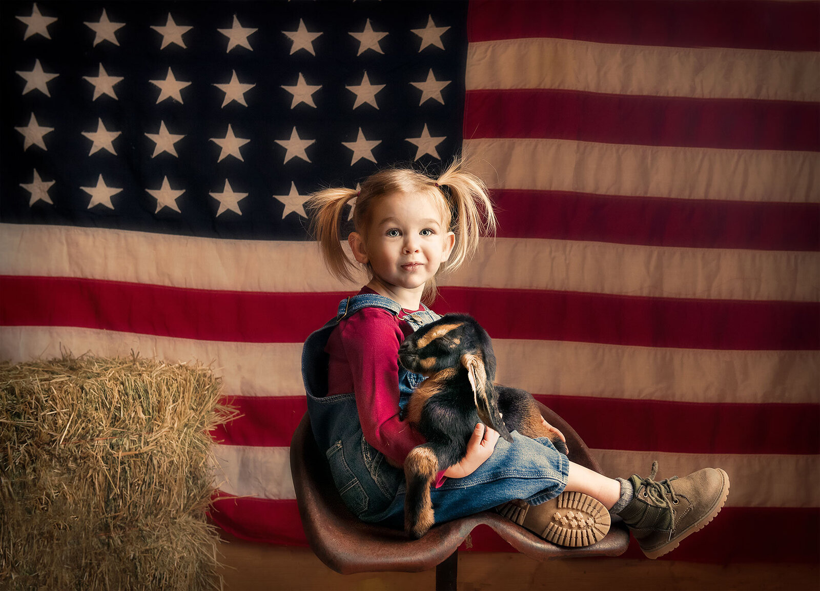 Children portrait - photo session with a baby goat