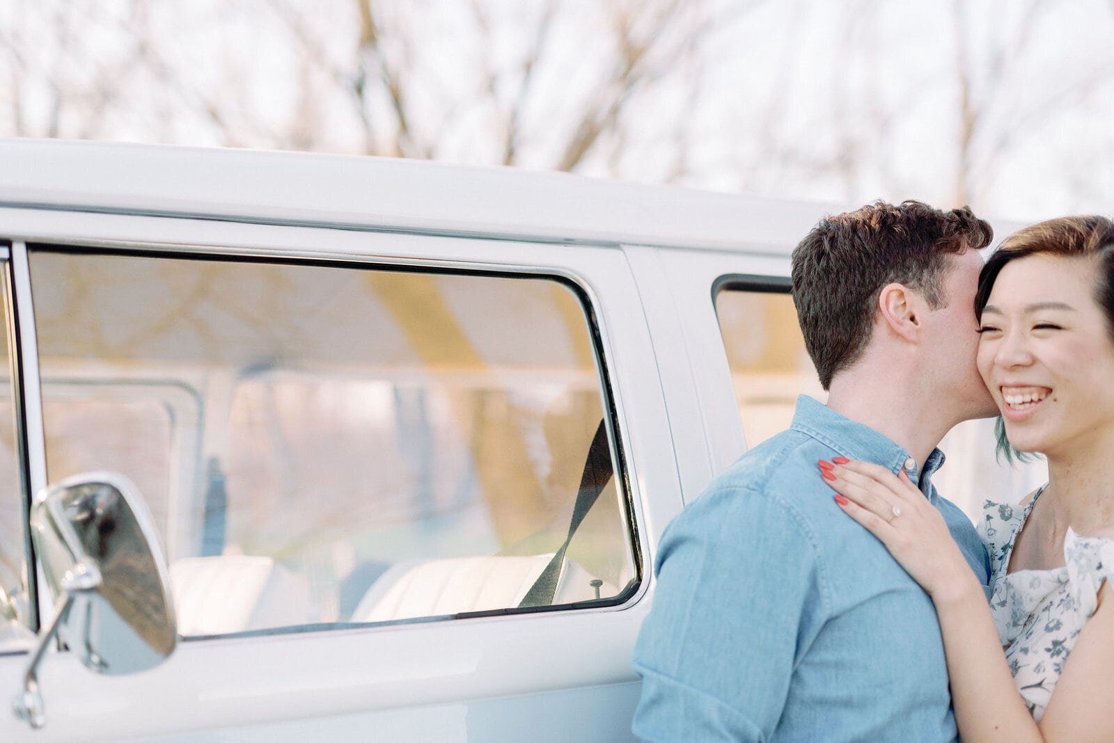couples embrace at cherry beach toronto engagement withwendy sewing youtube volkswagen camper van jacqueline james photography