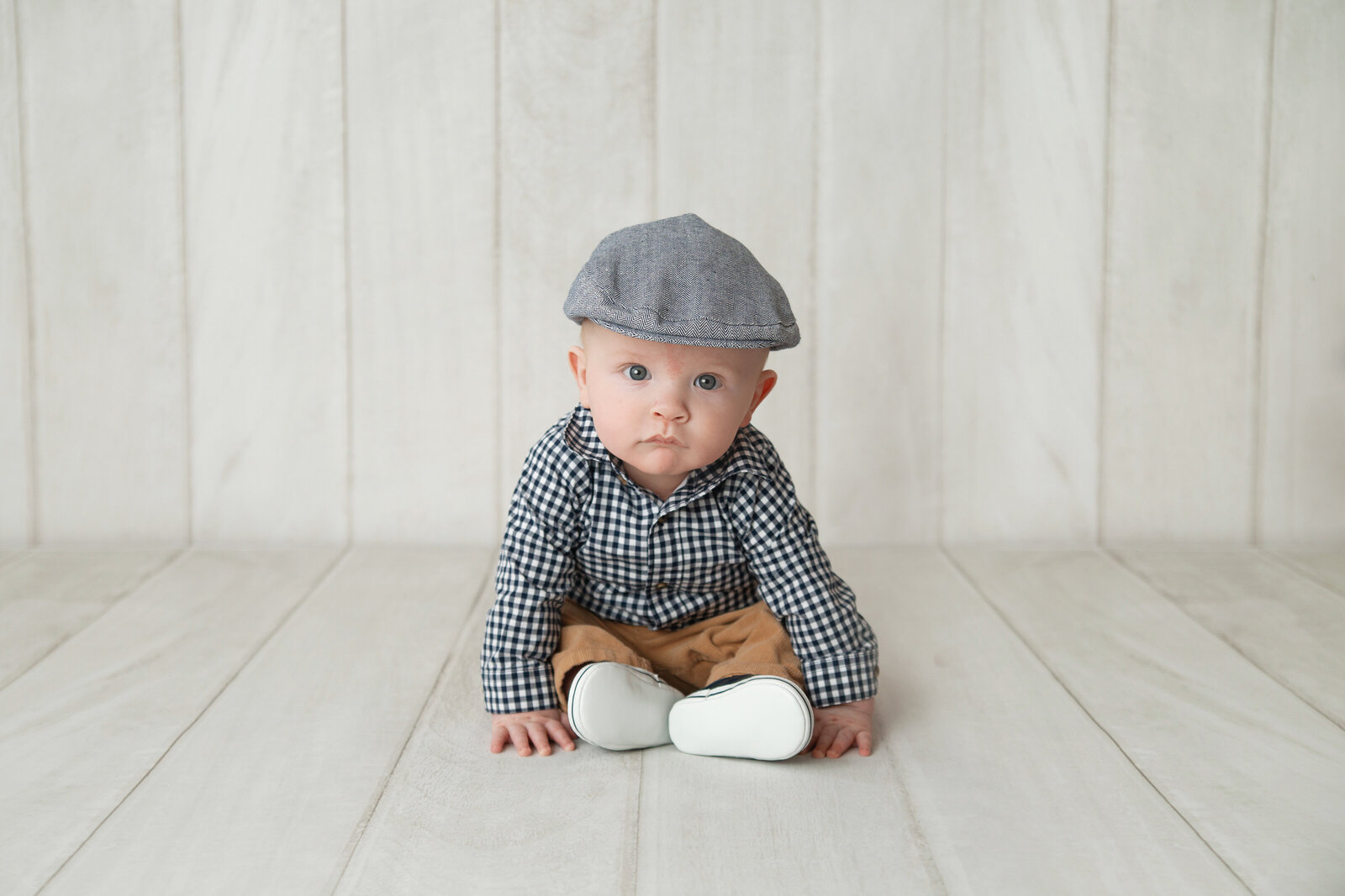 little boy in newsboy hat