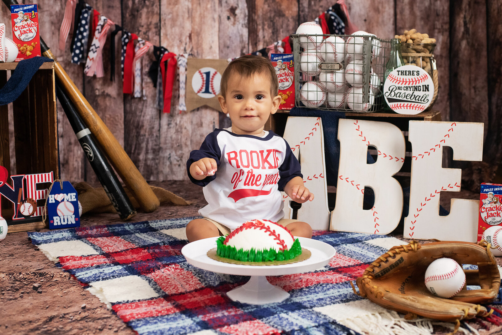 baseball-cake-smash-first-birthday-portrait-happy -baby-boy