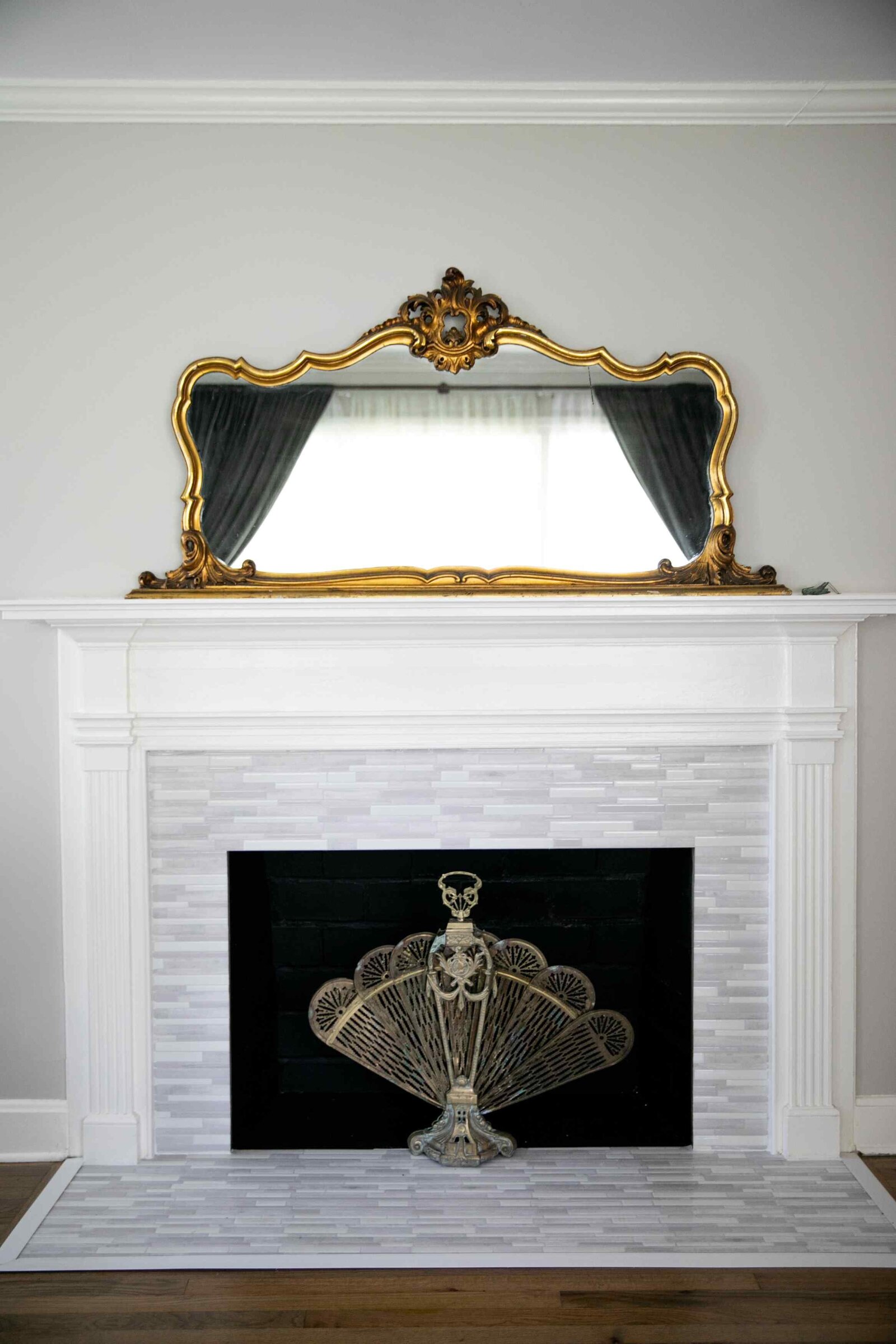 front view of mantle and antique mirror