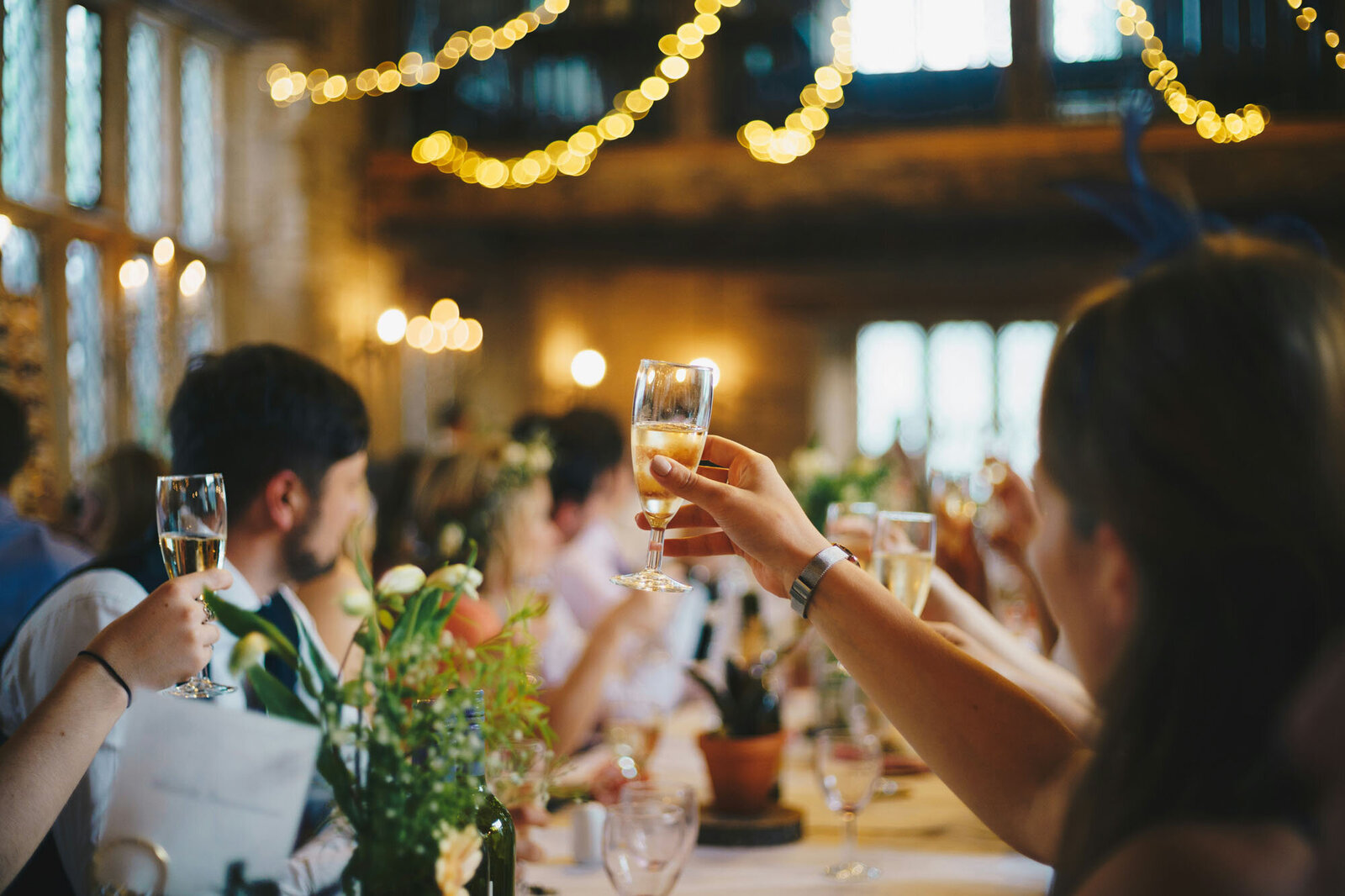 Group of people are toasting with champagne glasses