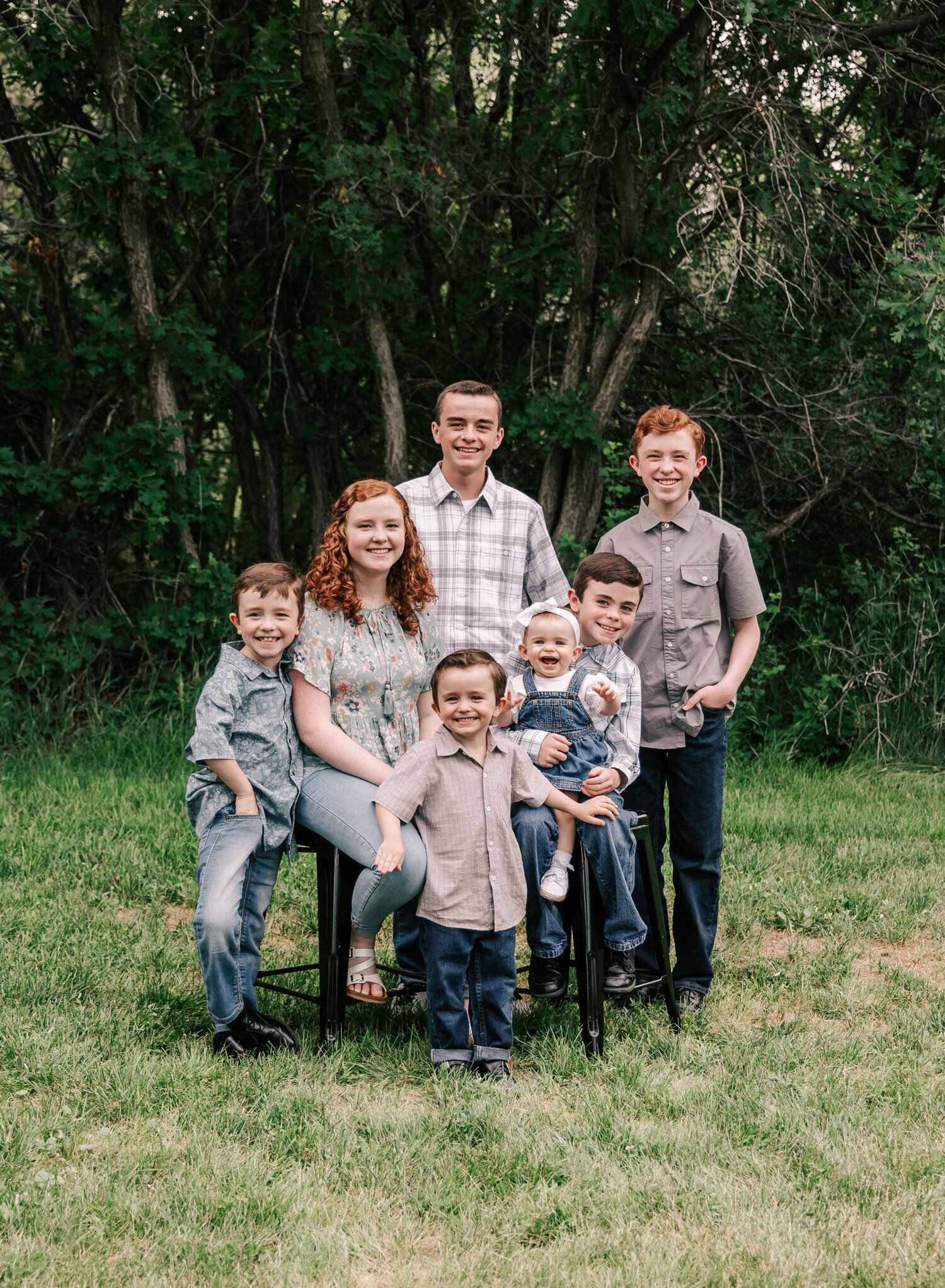 Siblings pose during their outdoor family session by Diane Owen Photography.