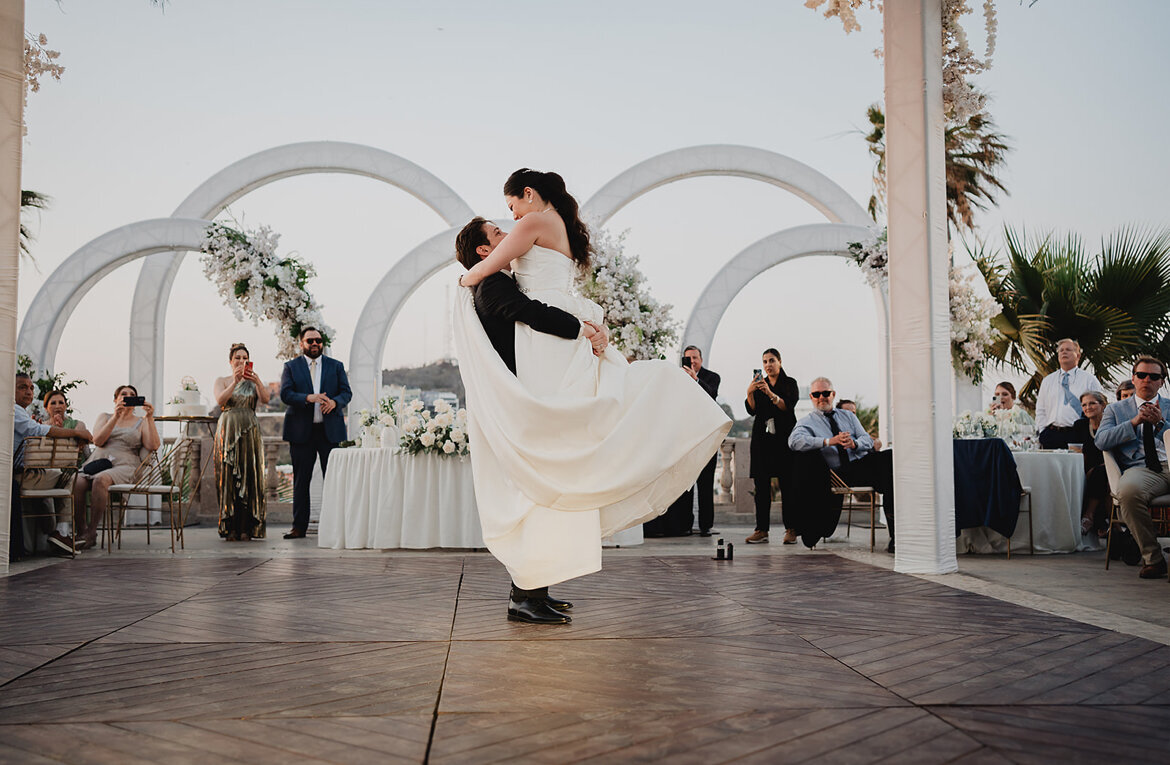 Bride and groom's first dance in an outdoor reception