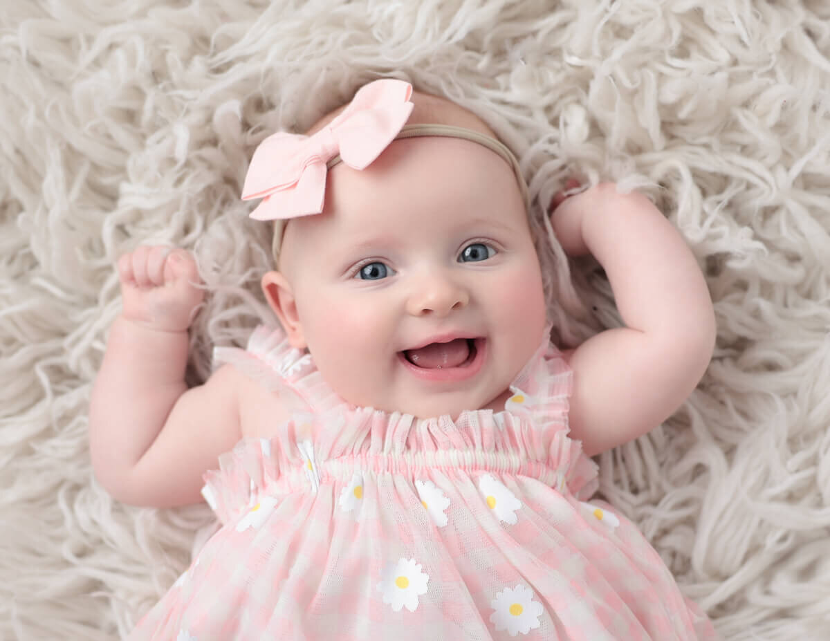 Precious three month old posed at our Rochester, Ny studio.